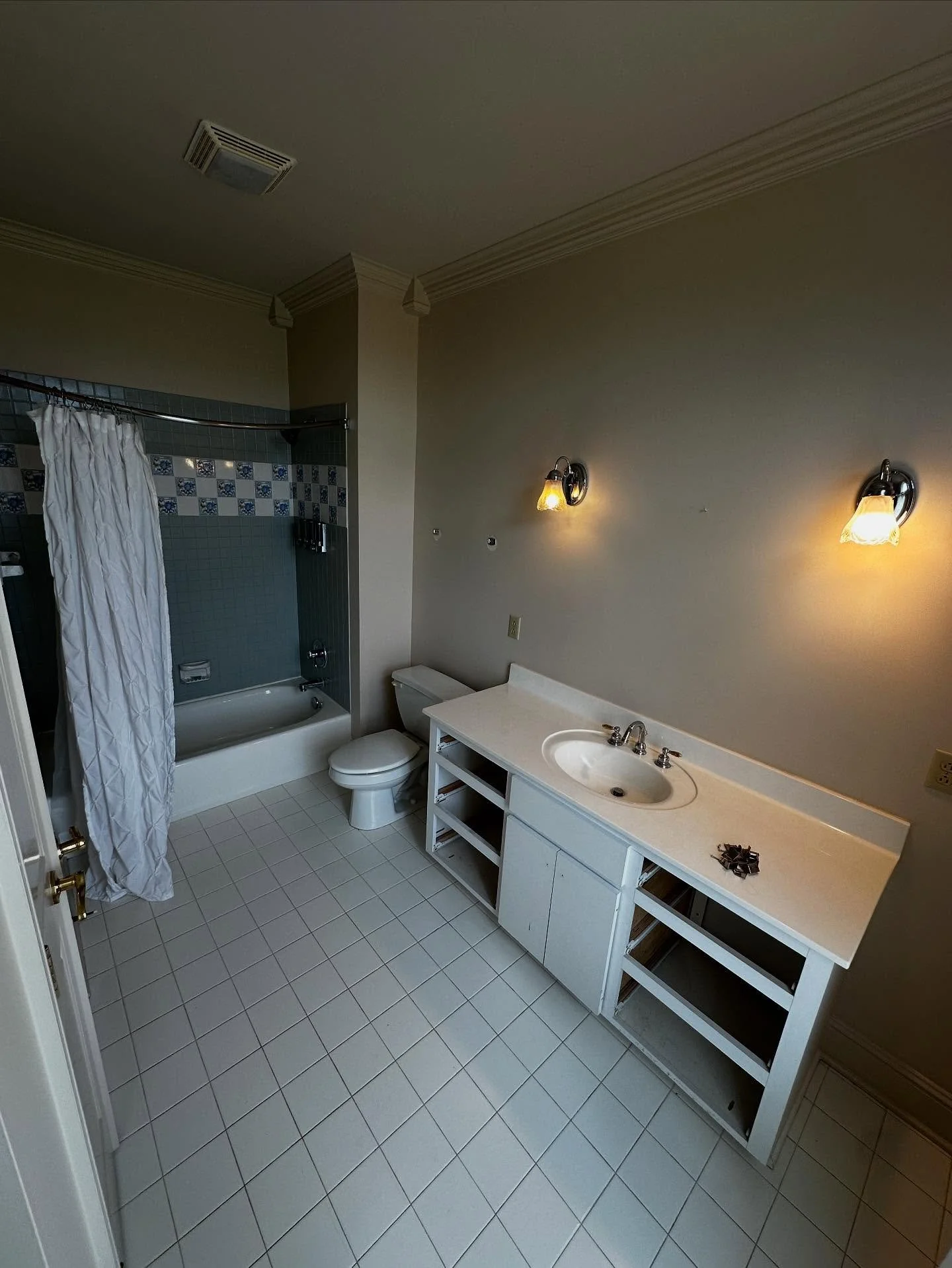 Before and after of a bathroom completed last month!