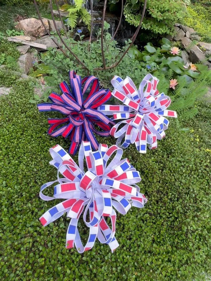 How cute are these bows for the 4th of July!! These are the perfect festive addition to your door or favorite wreath. Come shop with us! ❤️💙🇺🇸 #fourthofjuly #doordecor #usa #ribbon #shoplocal