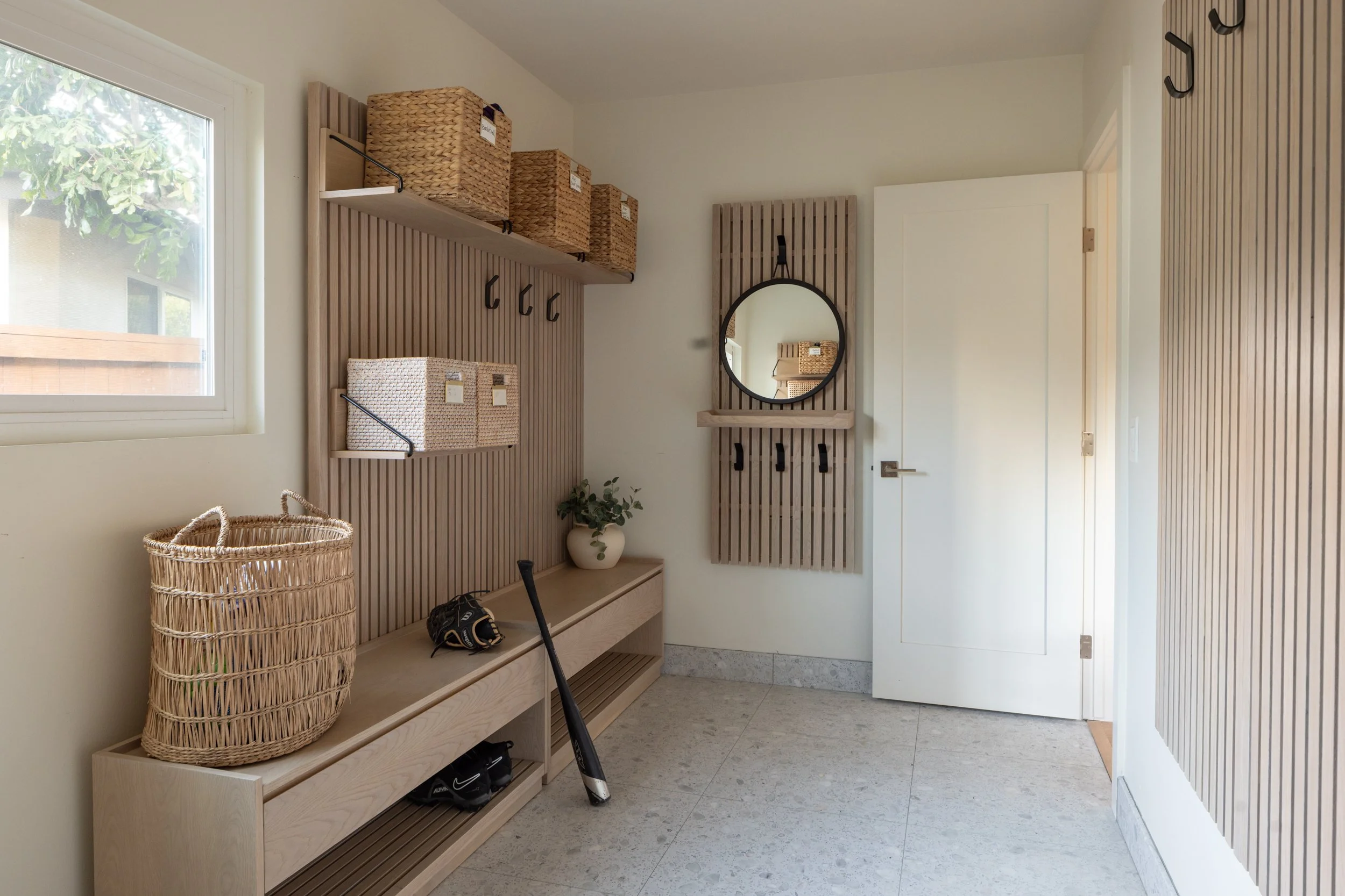 la-jolla-luxury-interior-design-mudroom-wood-slat-woven-storage.jpg.jpg