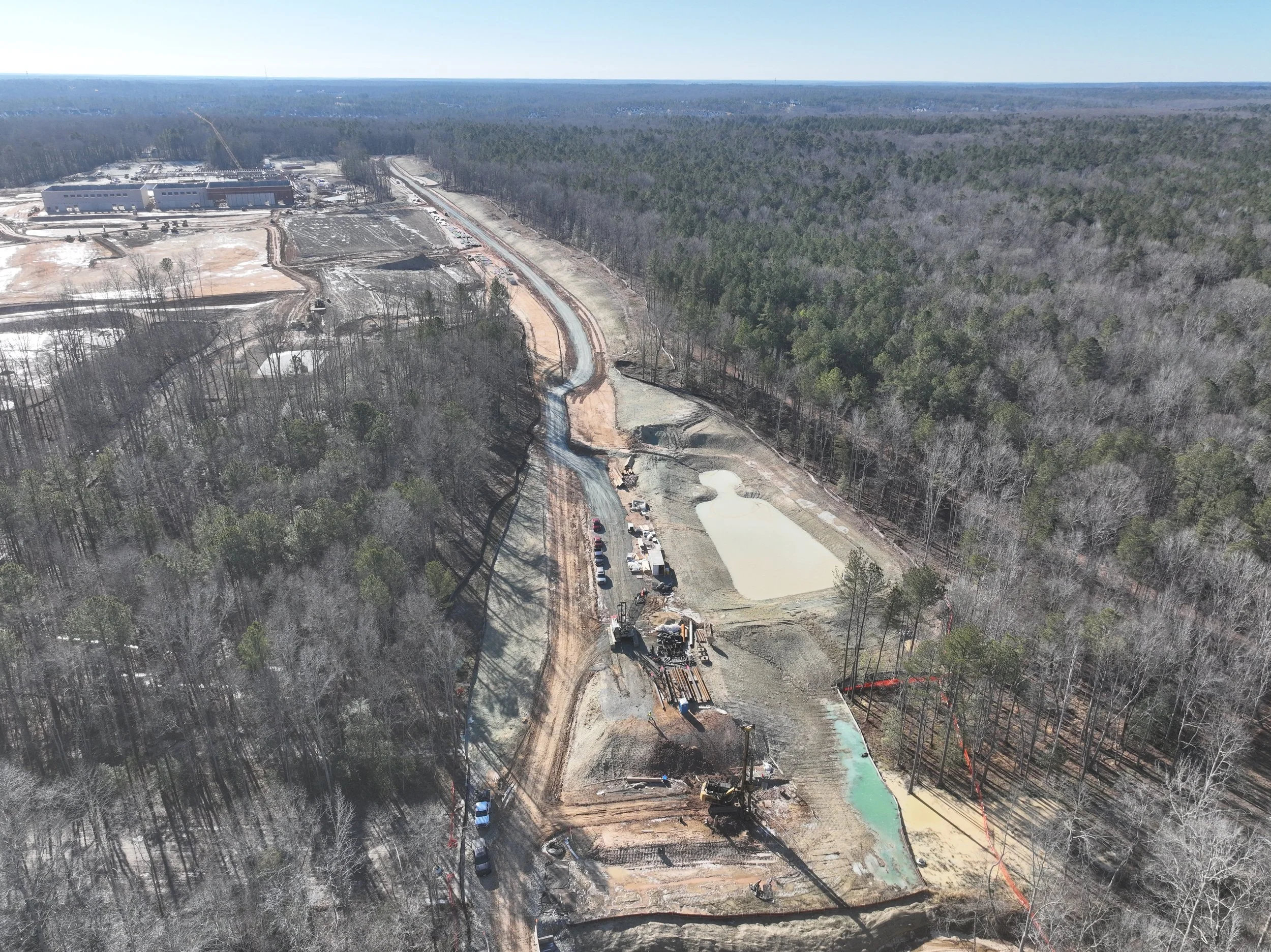 Dirt and pipe work continues. Waterline and bridge work begins.