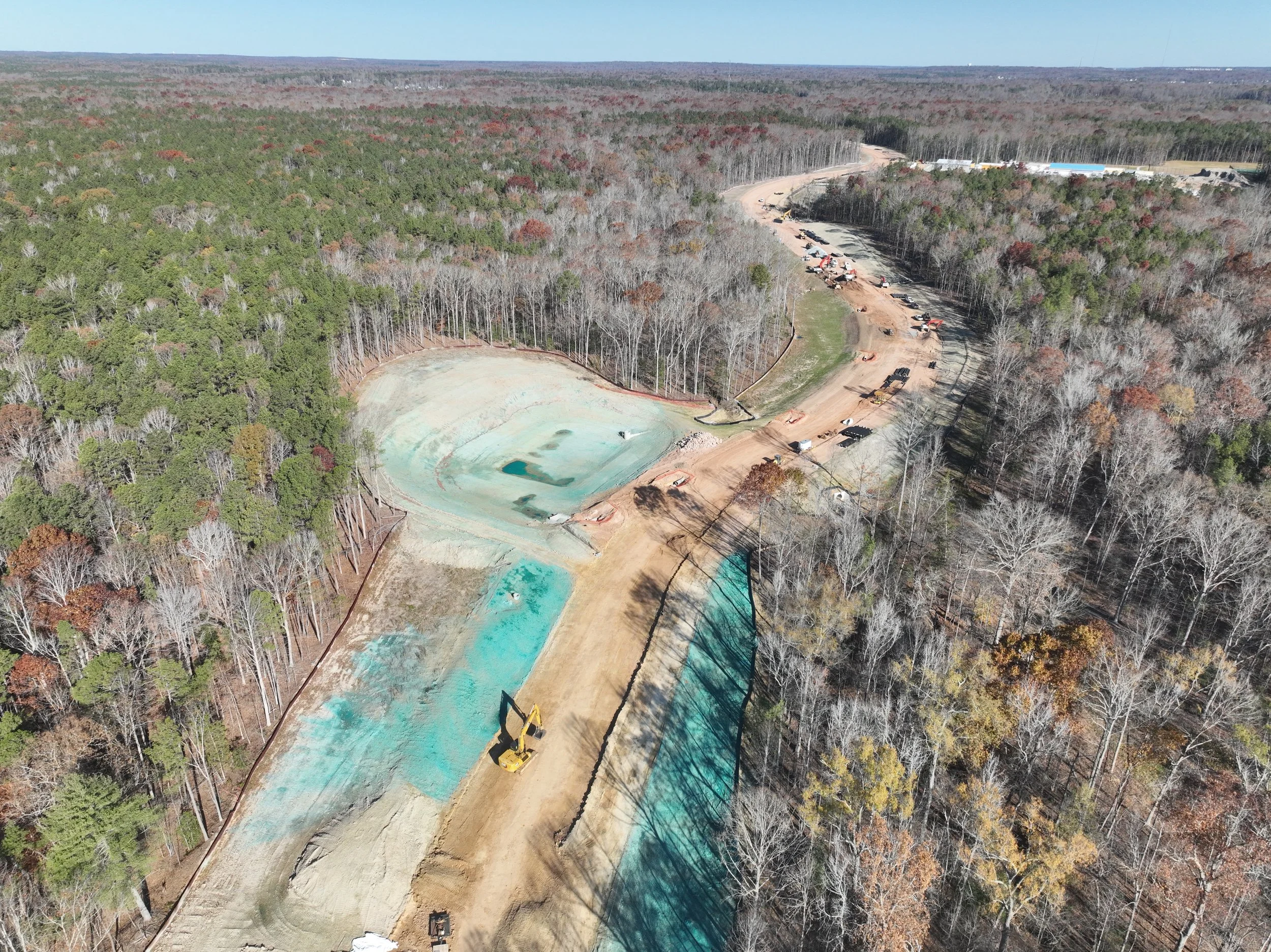 Dirt and pipe work continues. Waterline and bridge work begins.