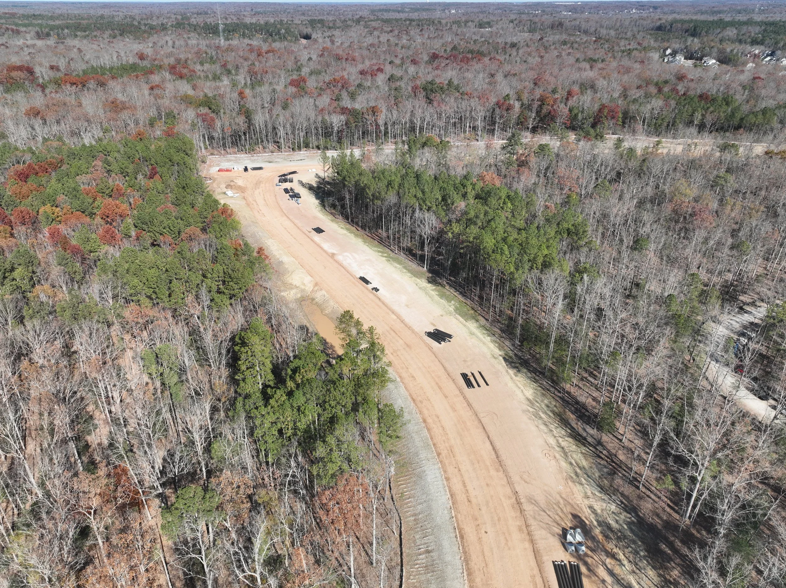 Dirt and pipe work continues. Waterline and bridge work begins.