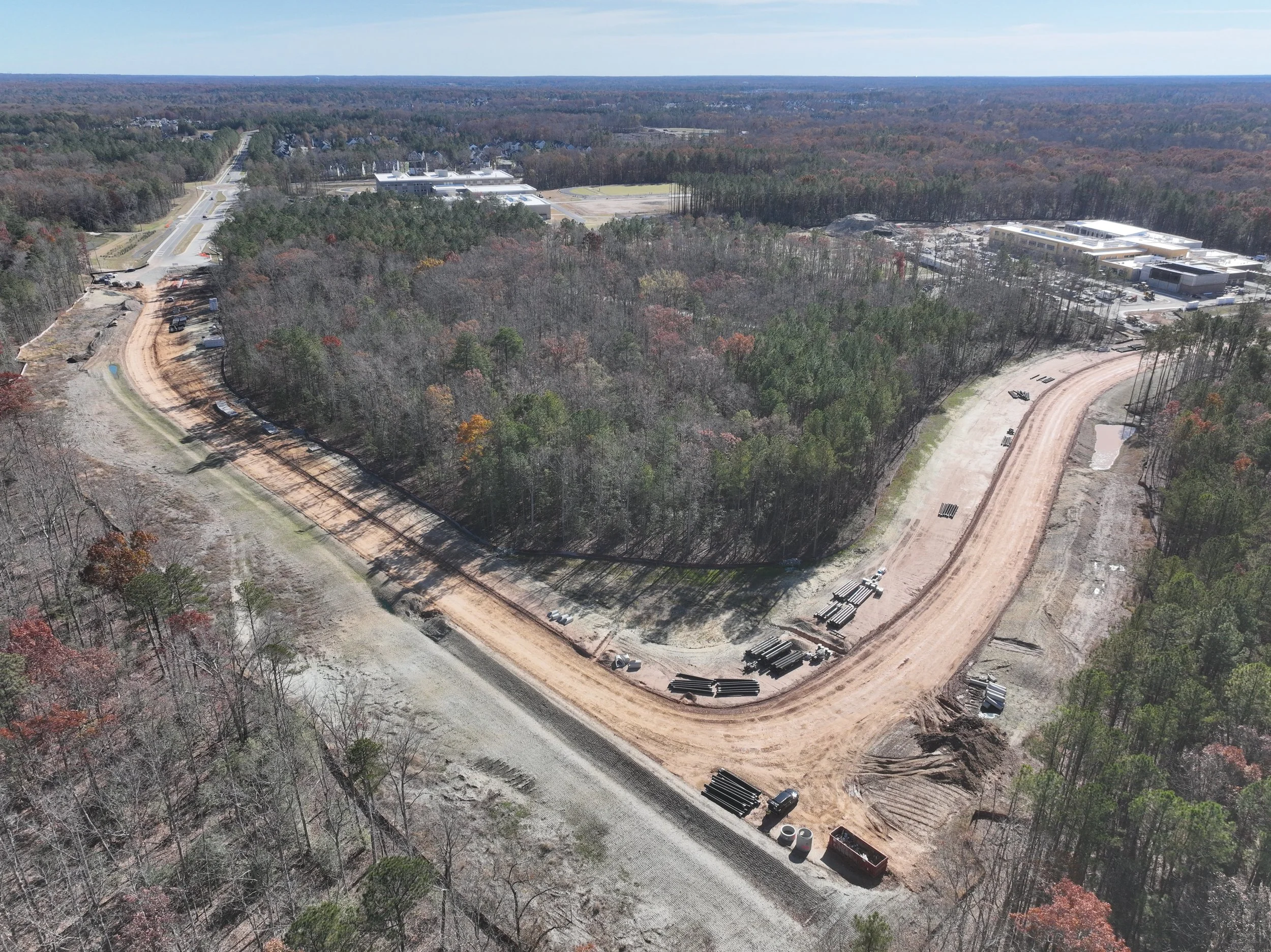 Dirt and pipe work continues. Waterline and bridge work begins.