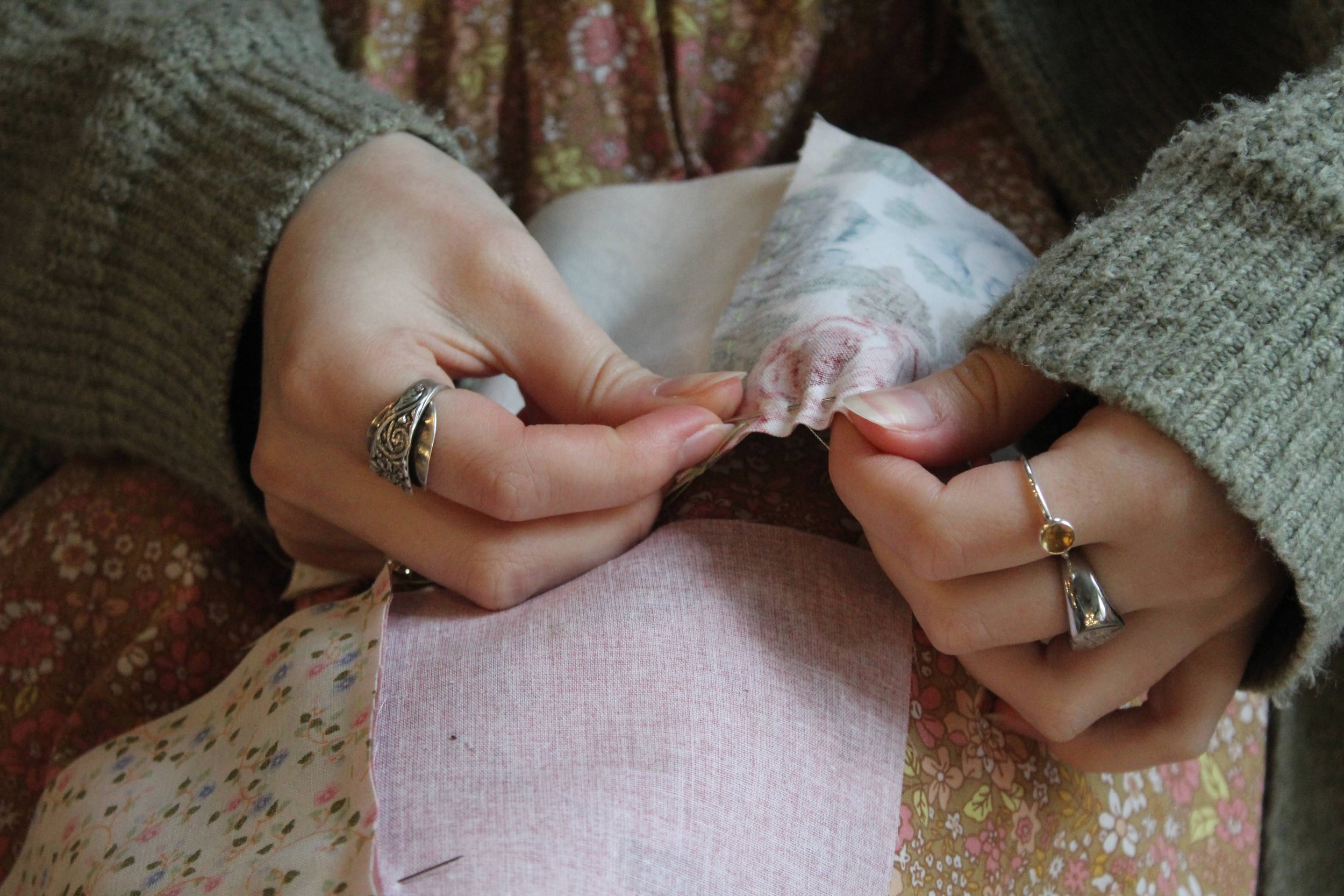 Close up of Ruby sewing