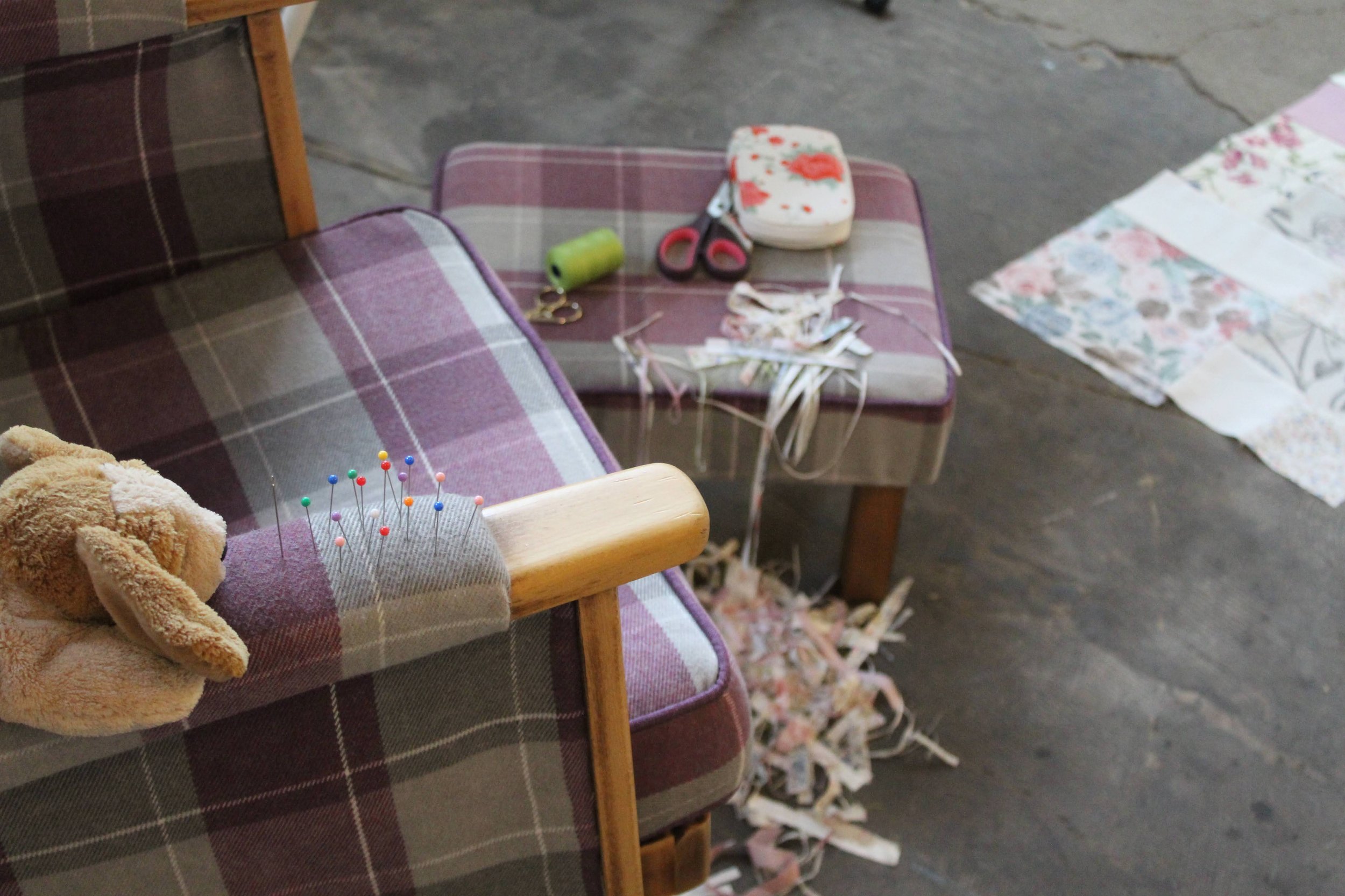 Detail image of 'Penelope' set. Fabric trimmings, a result of the performance, and Ruby's tools ready for use