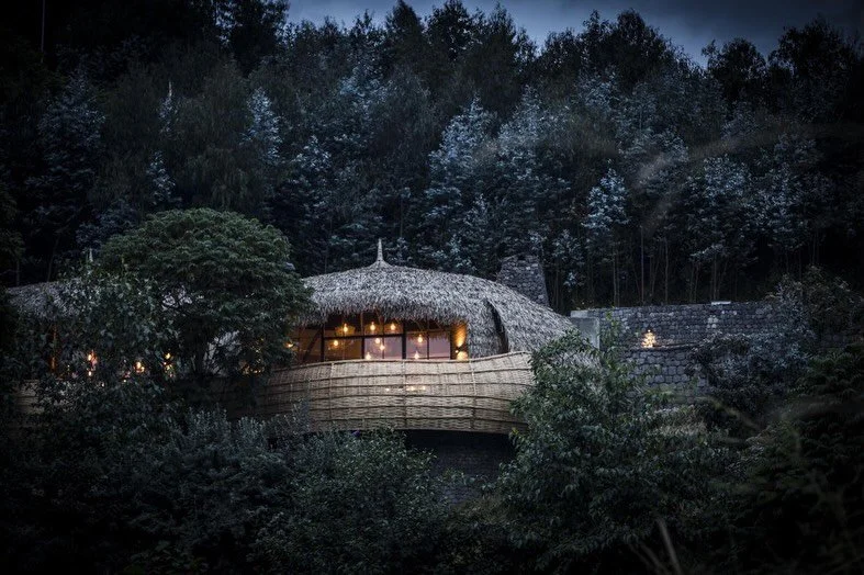 There are a handful of places in Africa that feel truly unlike anywhere else. Bisate Lodge is one of them.

Perched on the slopes of an ancient volcanic cone overlooking Volcanoes National Park, Bisate is as much a conservation success story as it is