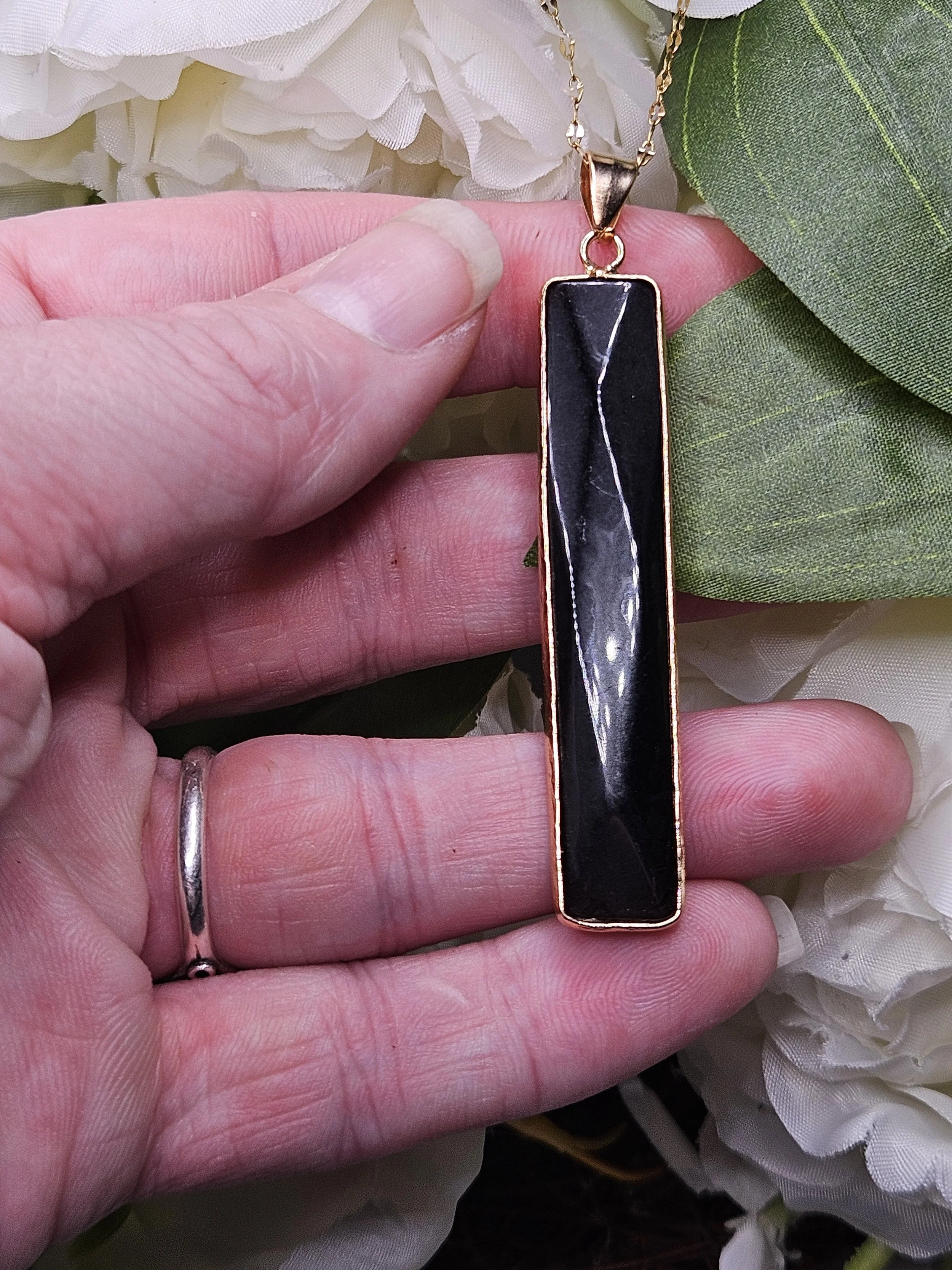 Gold Edged Faceted Obsidian Rectangle Pendant on Golden Chain