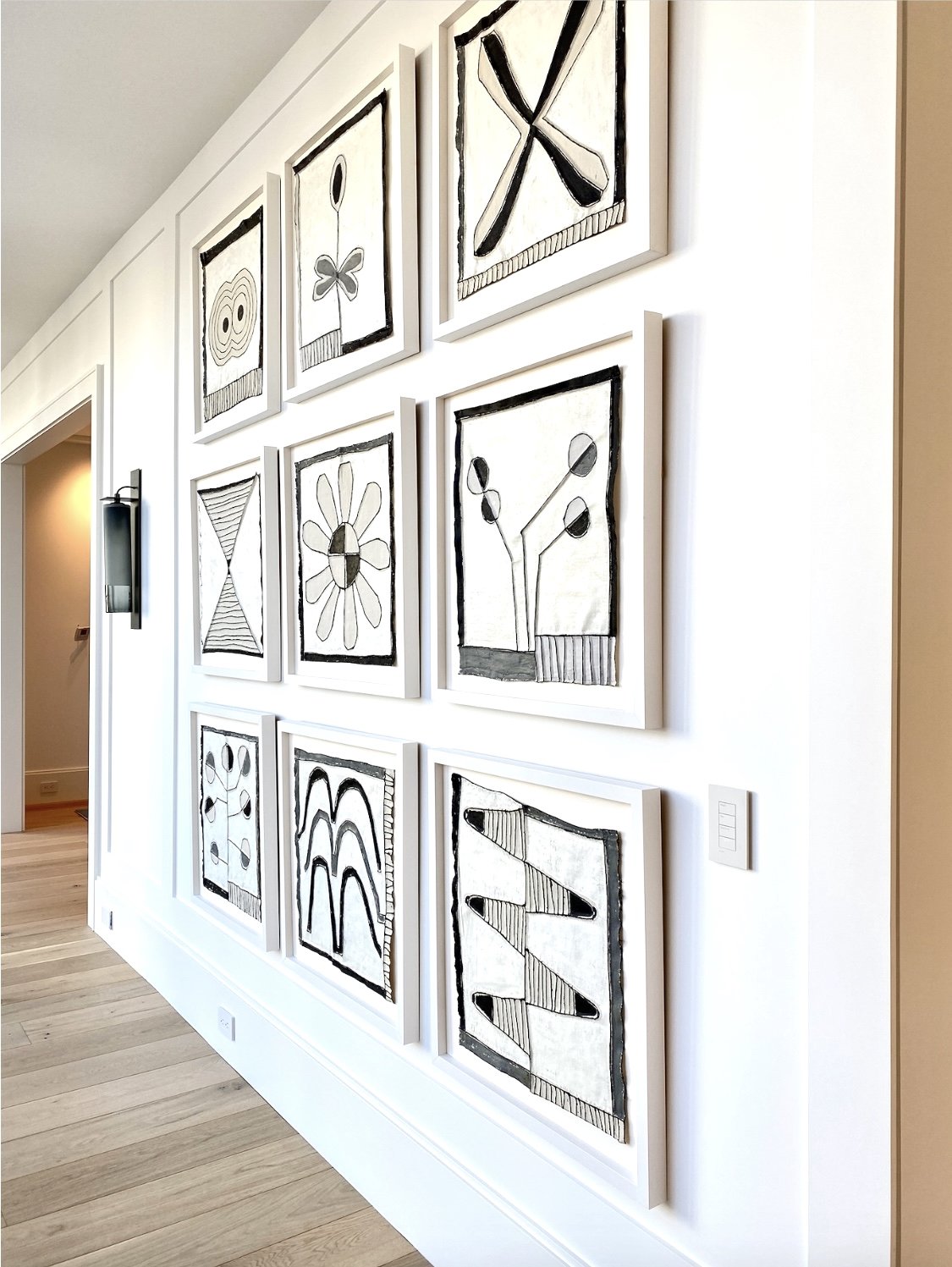 Lawrence, Deb_Know Her works framed grid in colector's space.jpg