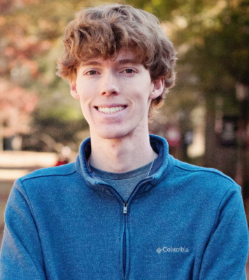 Stockletic founder McKeen who is the Financial Trail Guide for Stockletic smiling