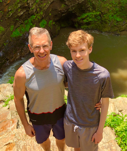 father and son on hike in the outdoors
