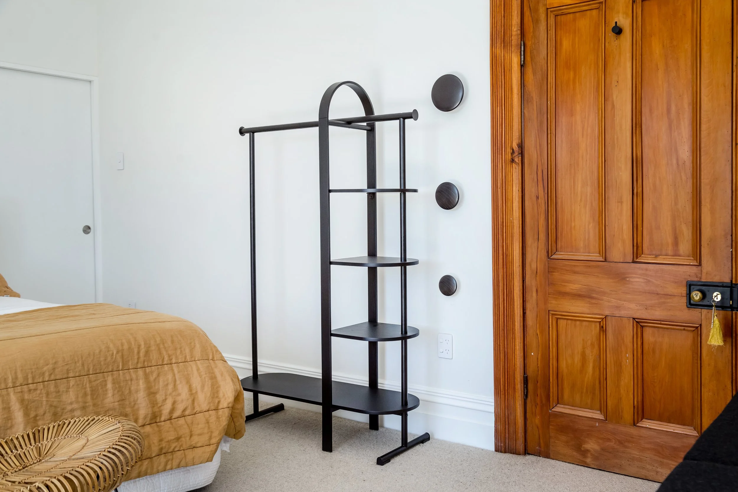 	
A modern white bedroom with ensuite. Clean simple lines with mustard and black accent colours, designer lamps and a black garment hanging rack. Great for weekend stays, small weddings, post wedding events, group gatherings, celebrations and holiday