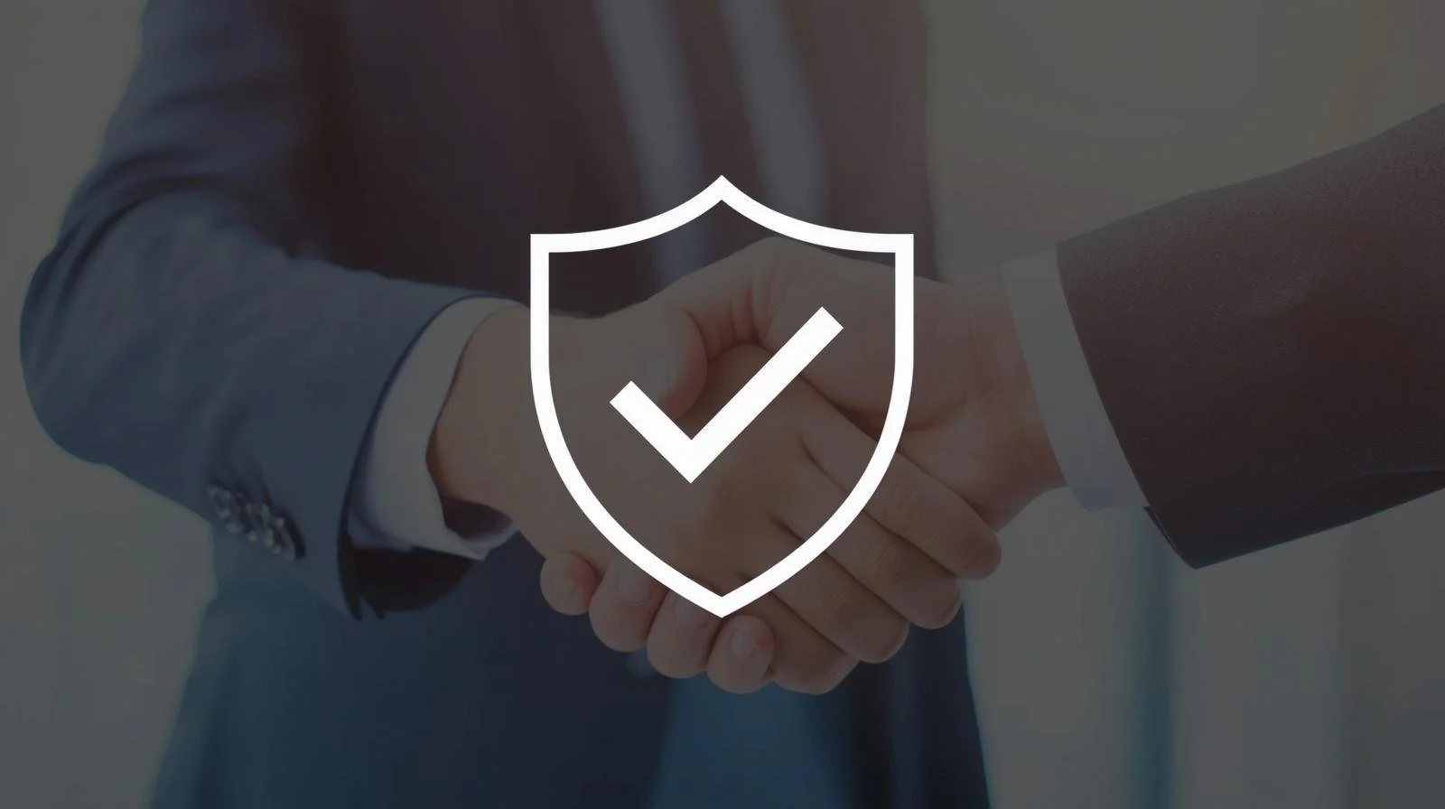 Two individuals in business attire shaking hands with a shield and checkmark overlay indicating security or agreement.