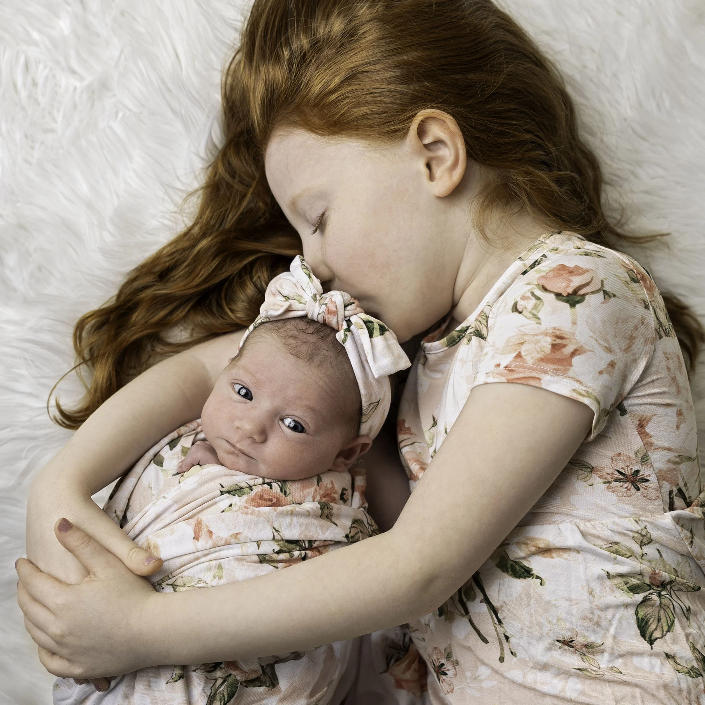 Sibling portrait during a newborn studio session in Davison, MI.