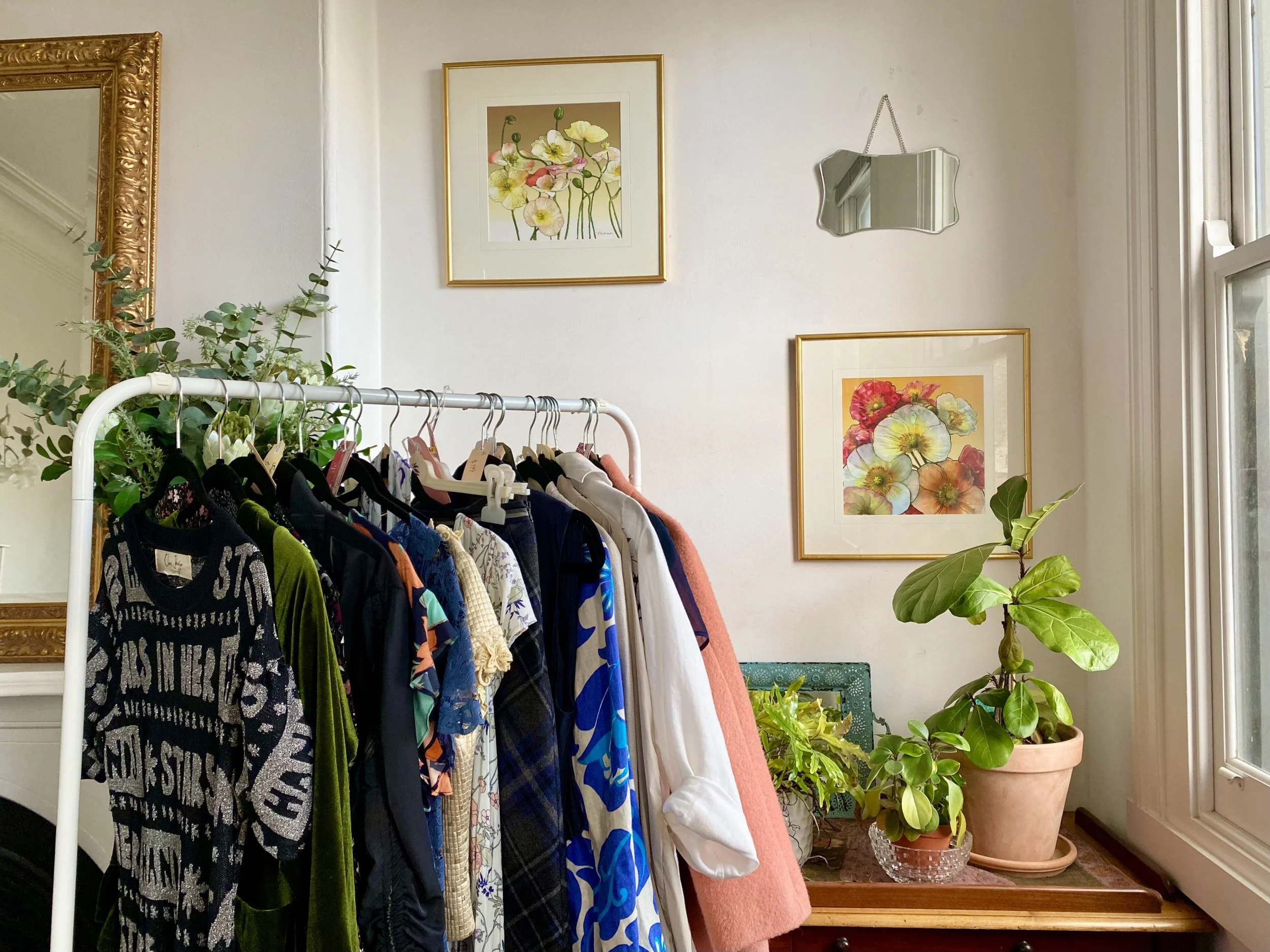 rack of clothes in Donna's studio