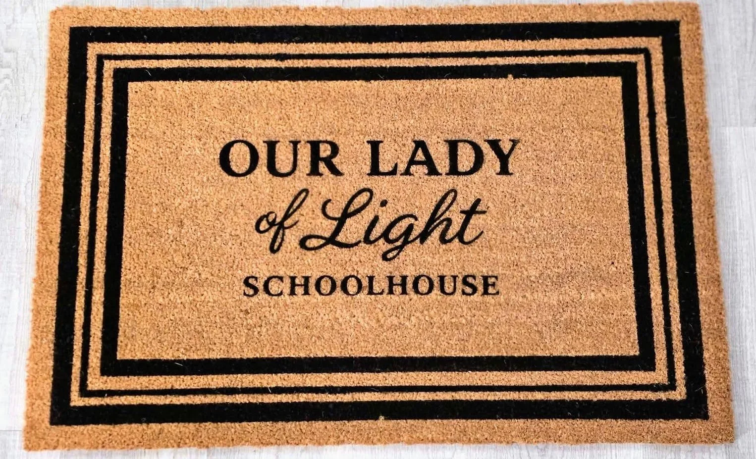 our+lady+of+might+doormat.jpg