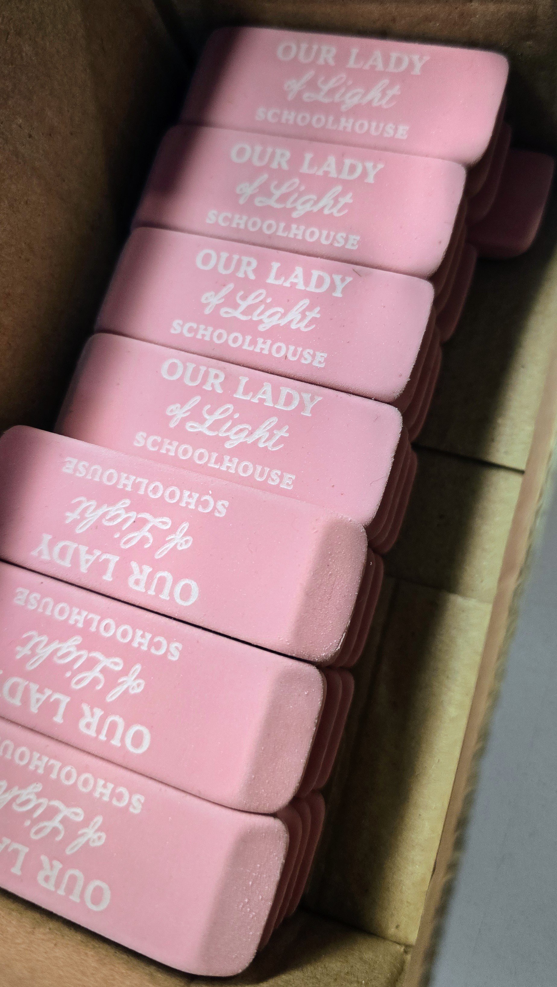 lady of light erasers.jpg