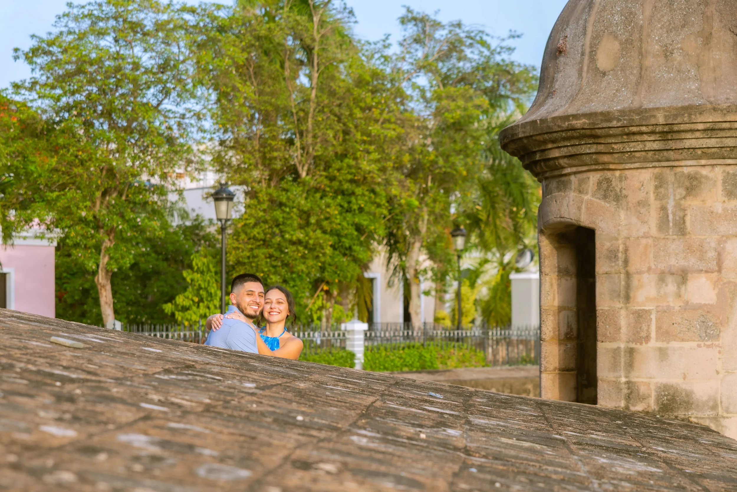 Newly engaged couple by a historic garita in Old San Juan