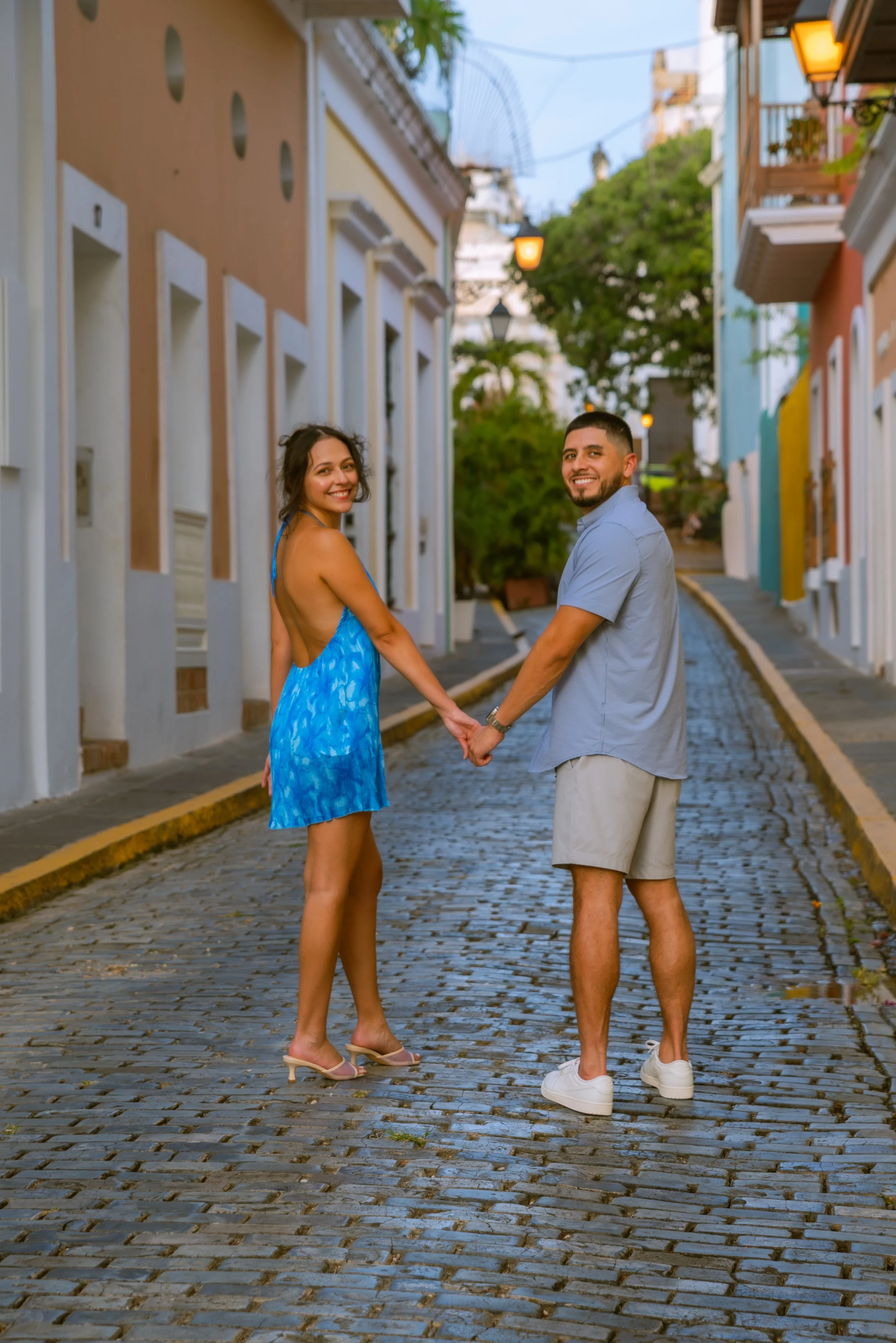 A beautiful couple walking on the colorful streets of Old San Juan