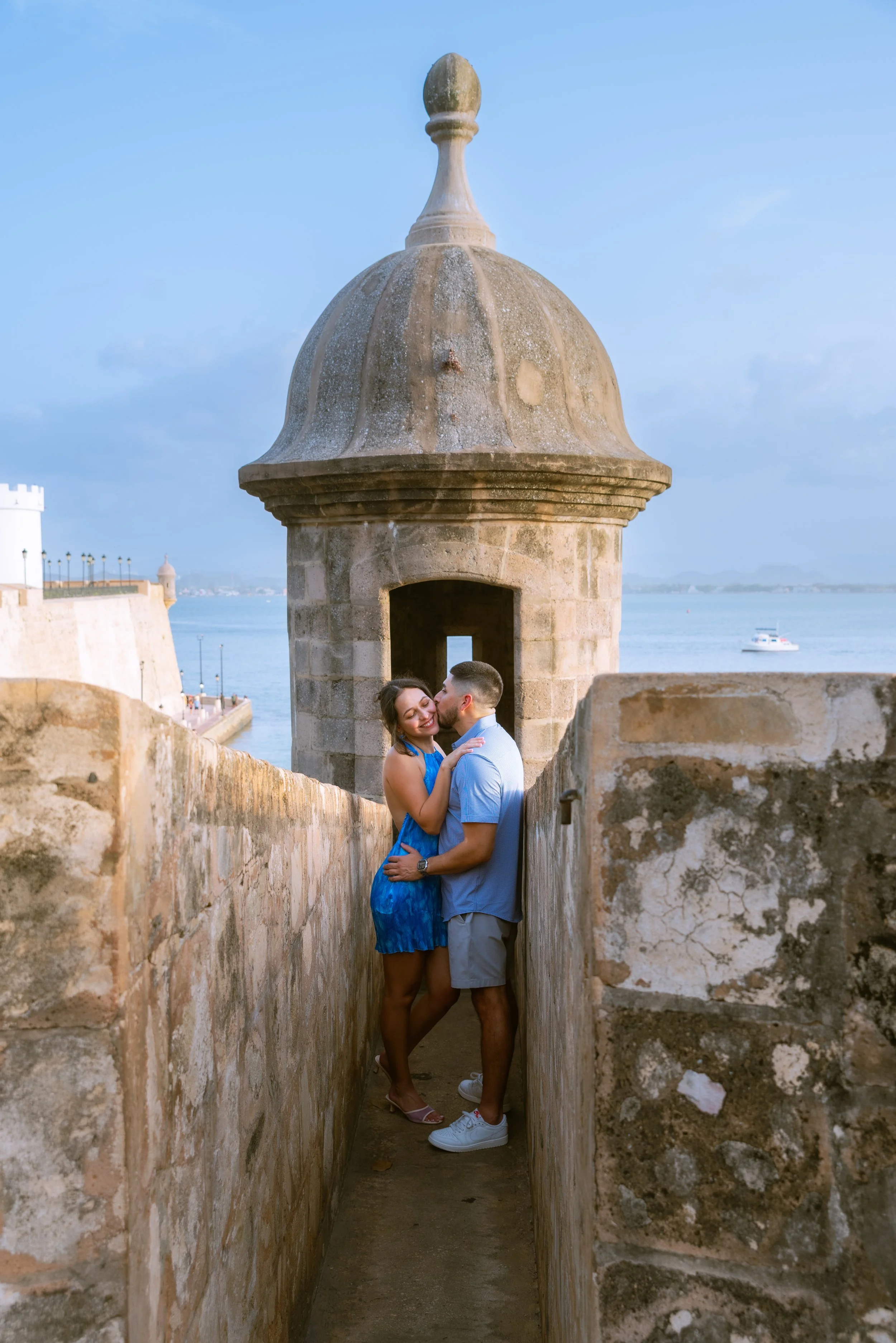 Newly engaged couple by a historic garita in Old San Juan
