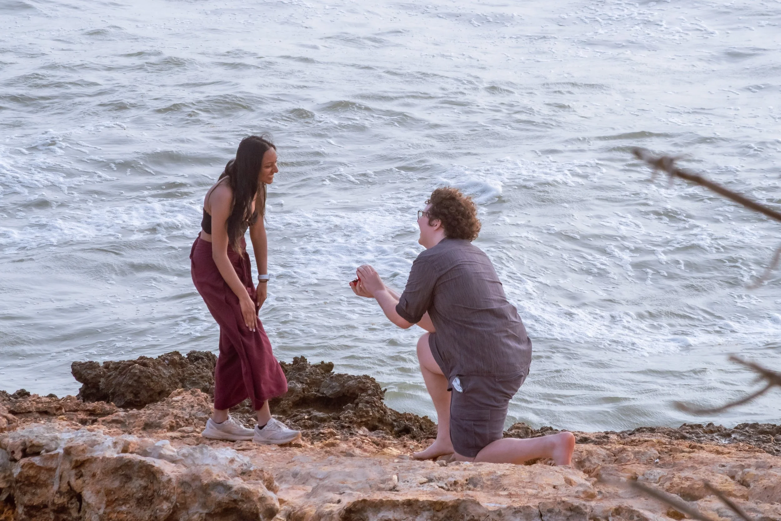 Man proposing to his partner by the ocean in Cabo Rojo Puerto Rico