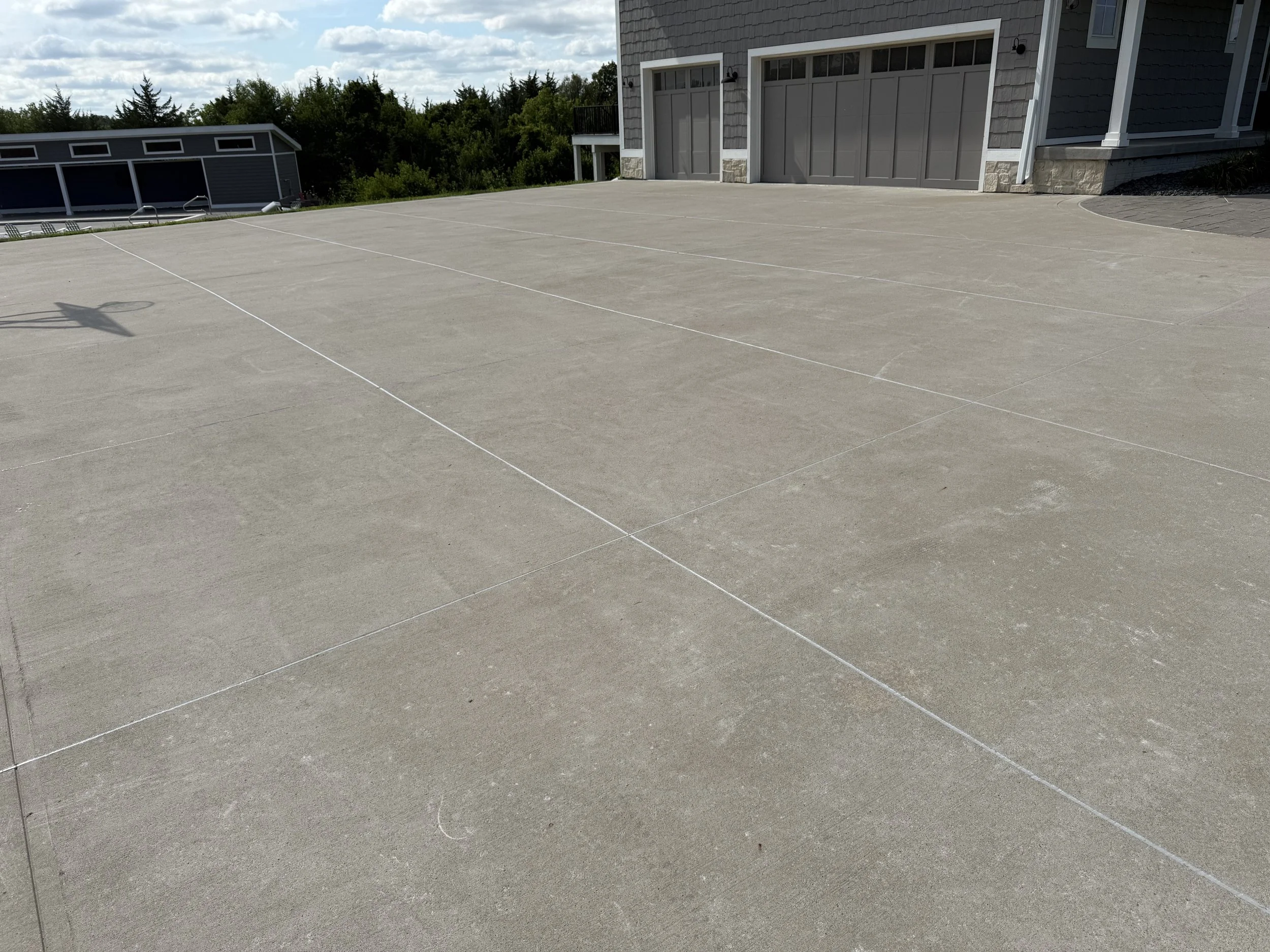 Massive, smooth-finished driveway, poured to last.