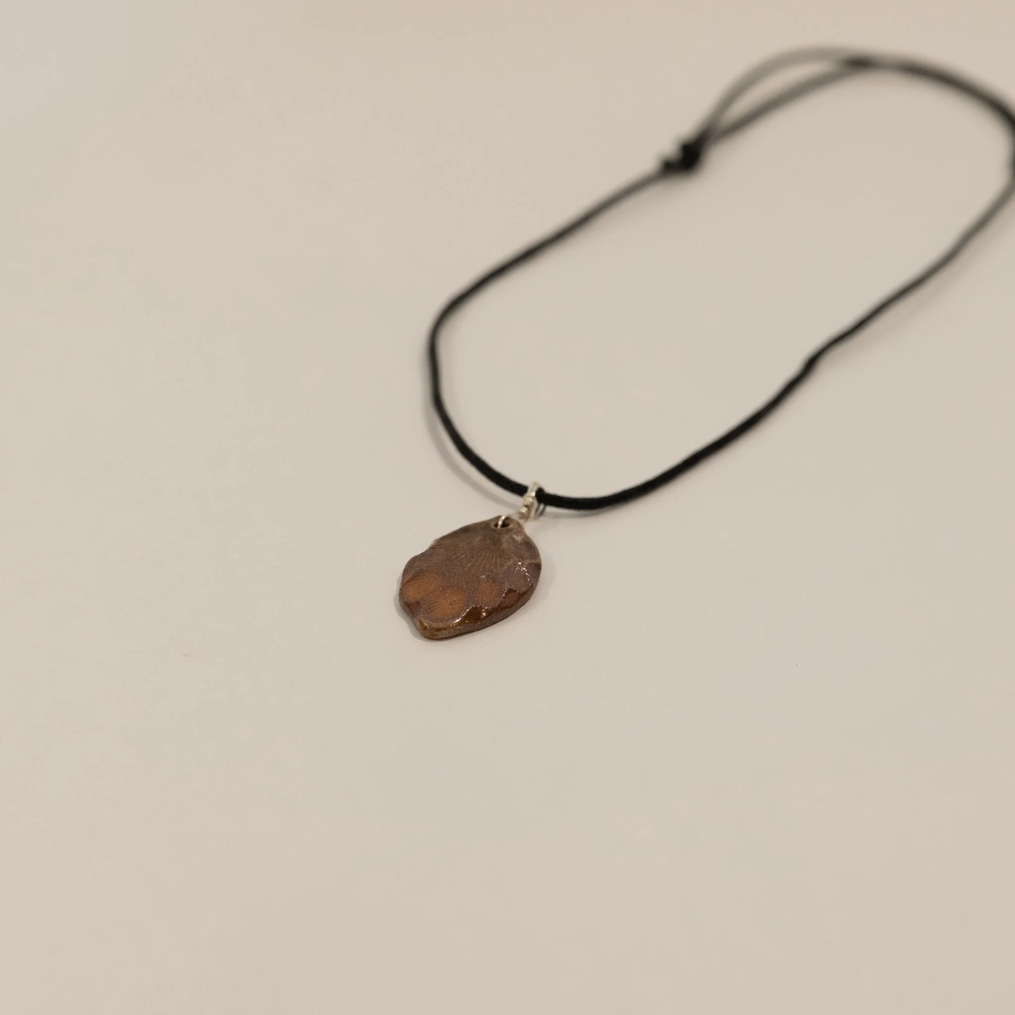 Shell Stamped Wood Fired Necklace