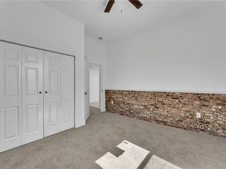 4082ndAveBedroomBrick.webp