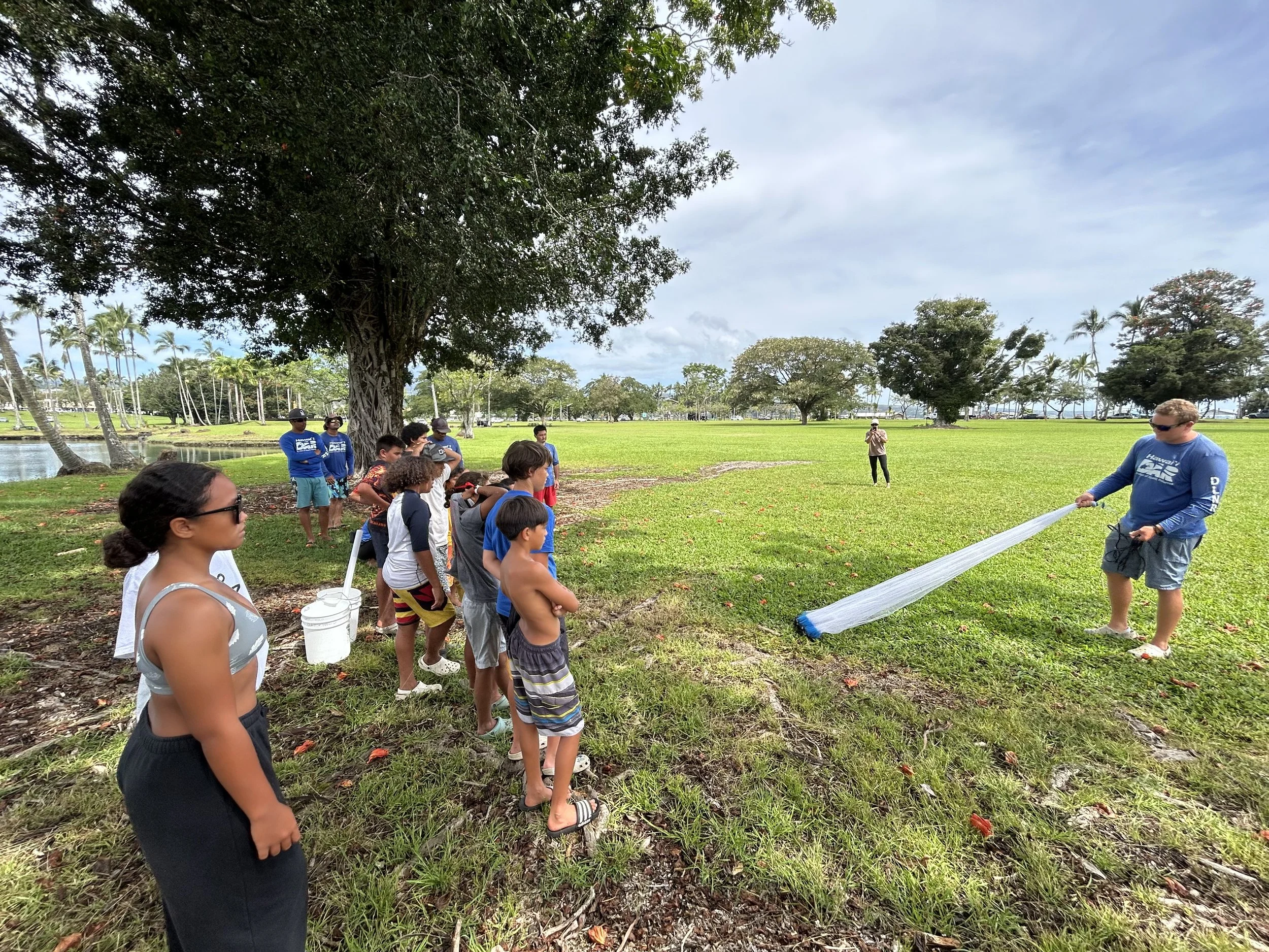 Haumāna from Hui Hoʻoleimaluō's Papa Holo Kai learn mo'olelo and fisheries management at Wailoa