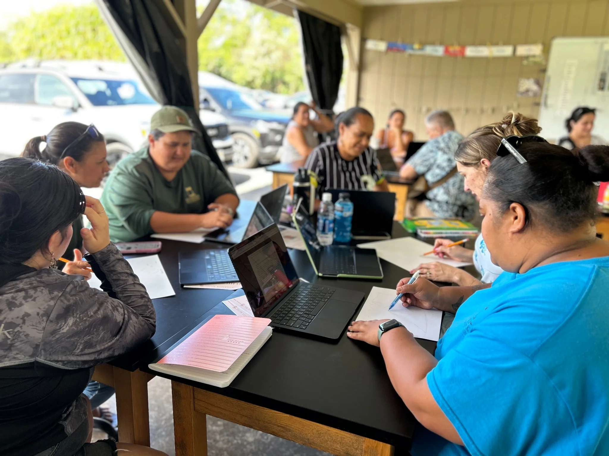 Papahana Kuamoʻo with educators from Ka ʻUmeke Kāʻeo Public Charter School