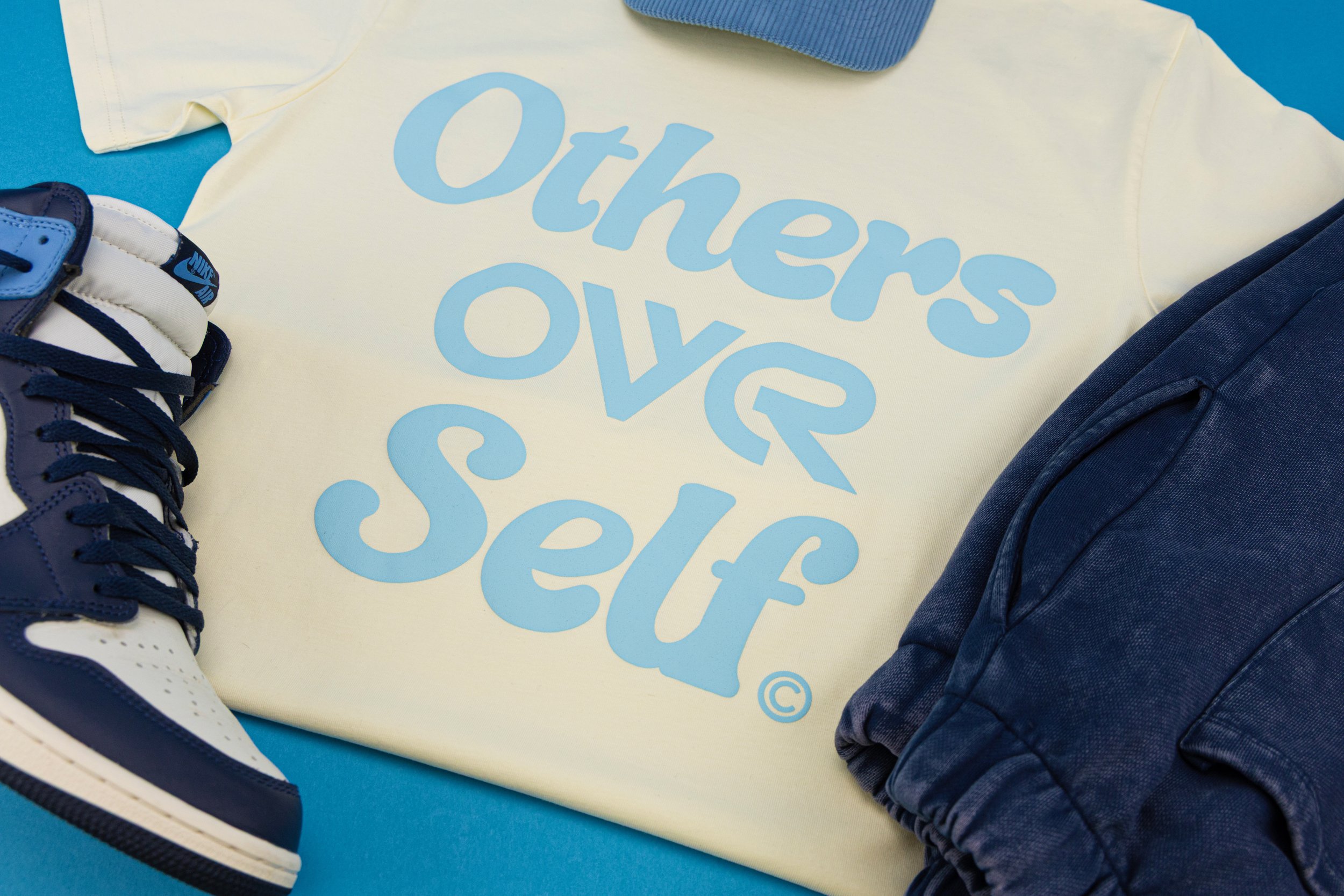 The "Slogan Tee" - Cream and Pastel Blue