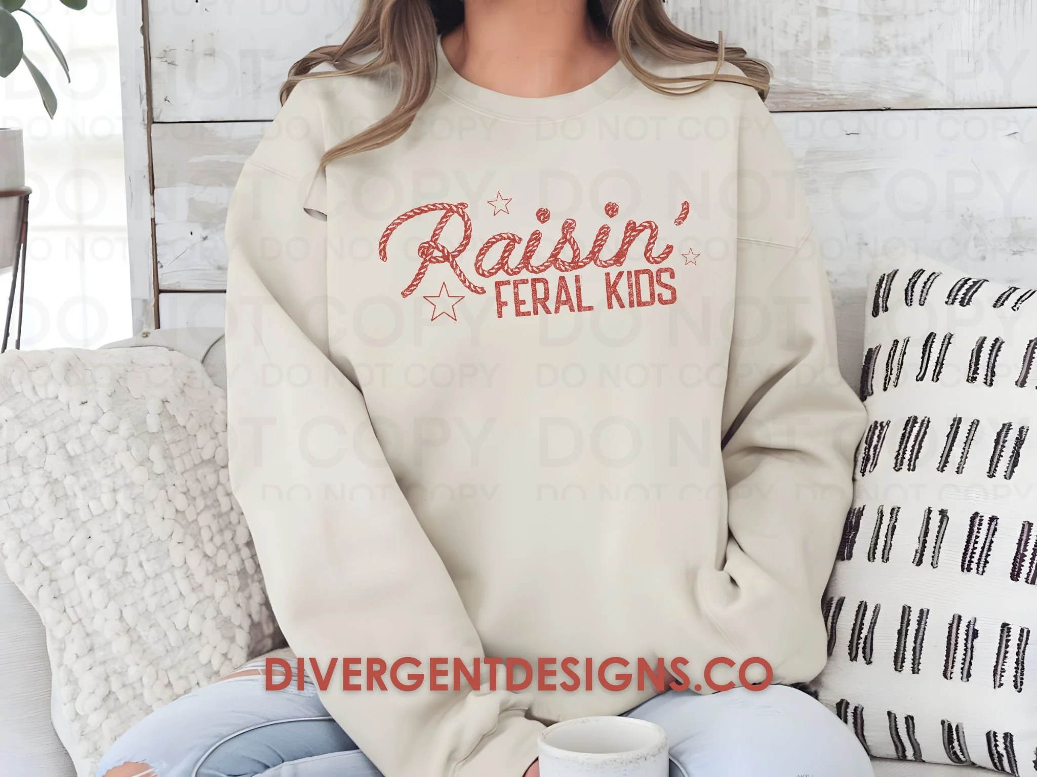This one might be my new favorite design &mdash; probably because it hits a little too close to home 😅

#momlife #feralkids #raisingkids #sweatshirtseason #cozyvibes #divergentdesignsco #realmomstyle #momhumor