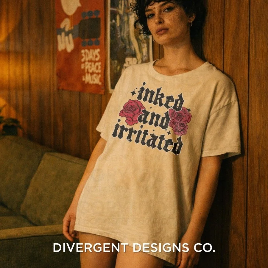 Inked and irritated. 🌹

Sweet? Yes.
Soft? Sometimes.
Tolerating nonsense? Absolutely not.

For the girls who love florals but also have boundaries.
For the ones who look cute and still mean business.

This tee is the perfect mix of feminine edge and