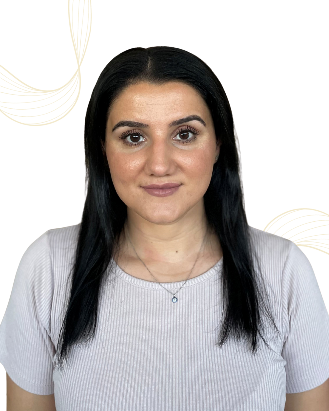 A woman with long black hair, wearing a light-colored ribbed shirt and a necklace with a small circular pendant, faces the camera with a neutral expression. The background is white with subtle gold circular line patterns in the corners.
