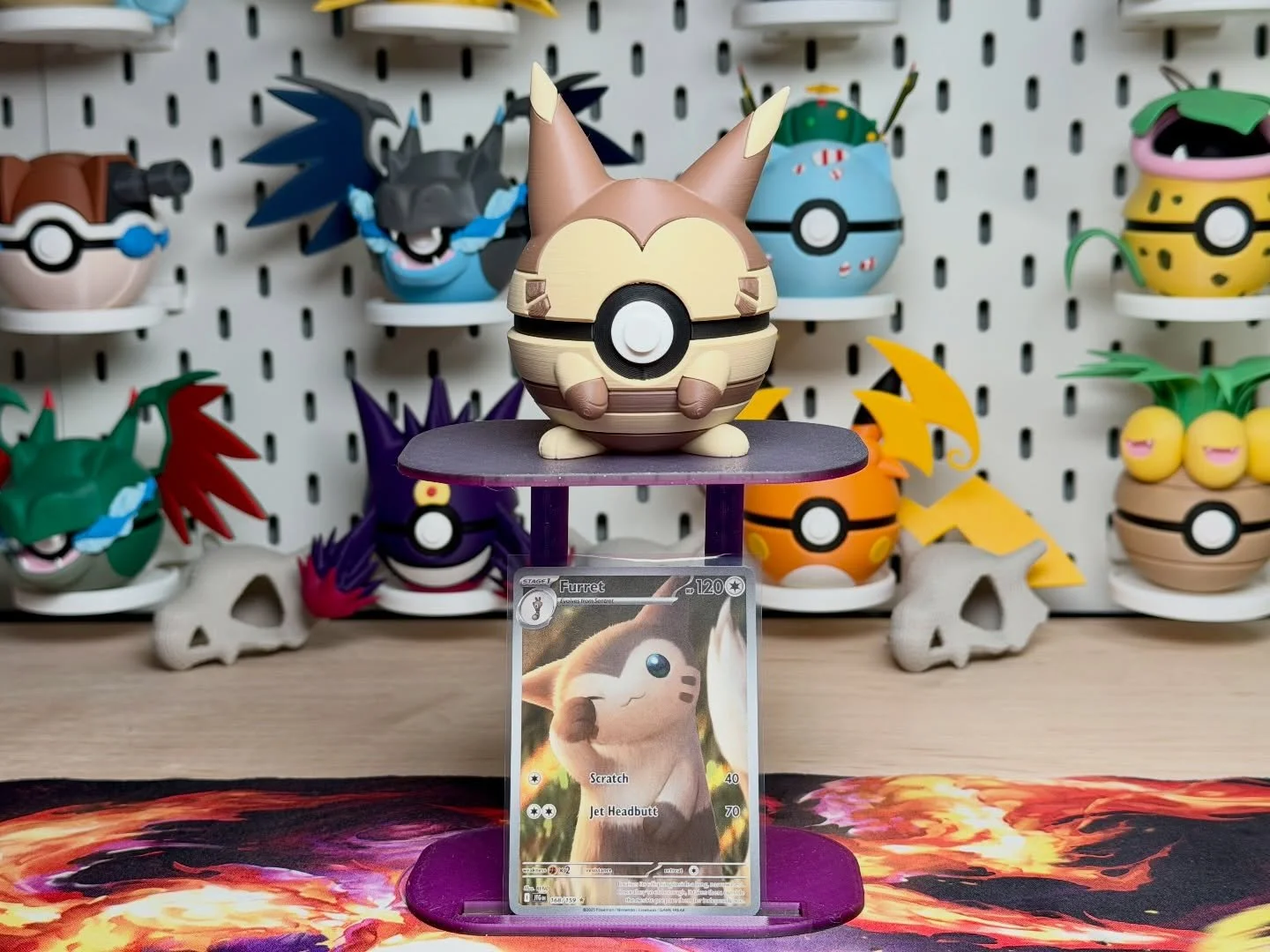 🦦 Designed in-house, built for collectors
This display stand shows off your card and your Pok&eacute; Ball or Funko Pop in one clean setup. Built with multiple size options to fit raw sleeved cards, toploaders, semi-rigids, or slabs

Available in a 