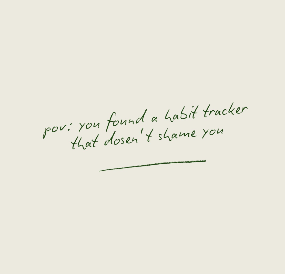 Handwritten note reading, 'pov: you found a habit tracker that doesn't shame you' on a pale background.