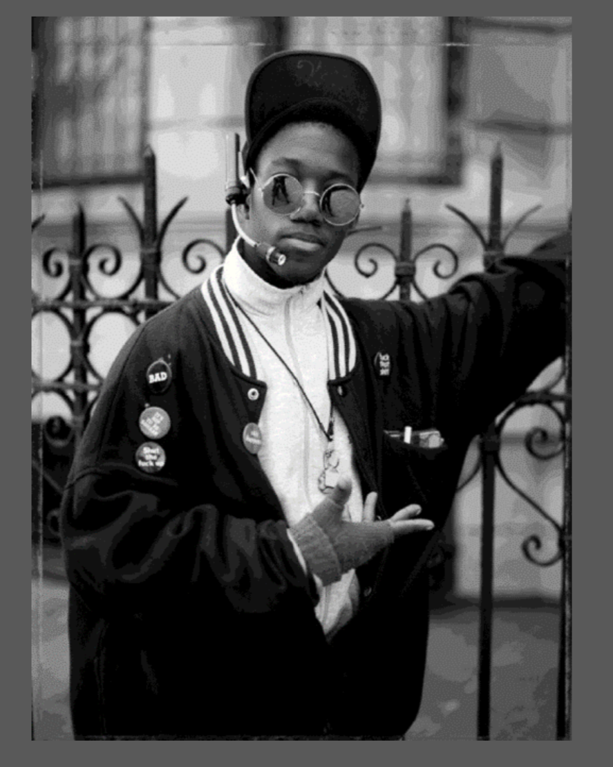 Dawoud Bey, A Young MC with Buttons, Brooklyn, NY, 1988, Archival pigment photograph. 2024 print.
Edition 2/4.