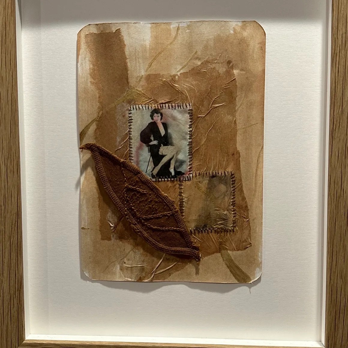 Enam Gbewonyo, Notes on Paper, Captured Sorrow VI, Used tights, cotton thread, used brown paper, tea stained tissue paper, vintage family photographs printed on tea stained recycled paper and metallic acrylic paint on tea stained handmade recycled pa