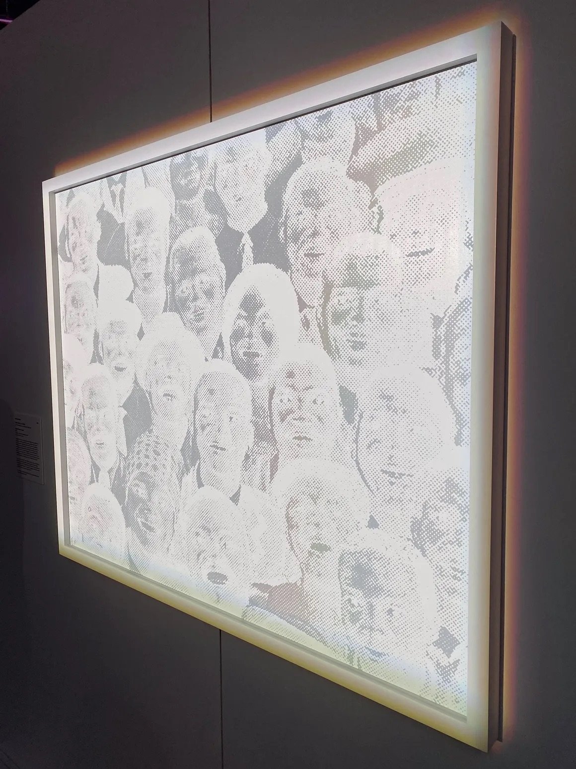 Hank Willis Thomas, History Doesn't Laugh, Ink print on white retro reflective material, 2013