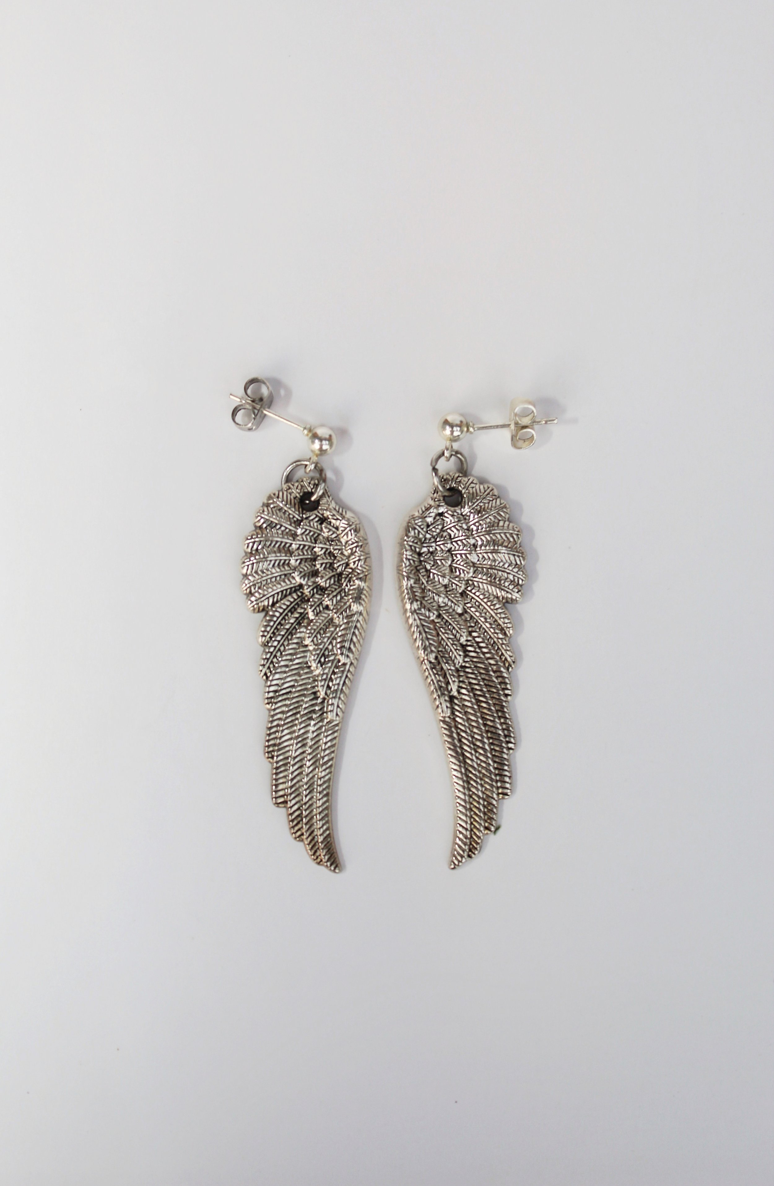 angel wing earrings.jpeg