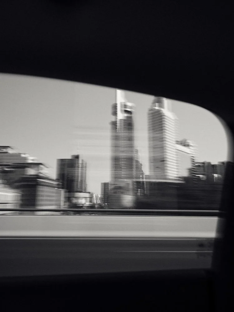 CITYMAG_HOMECOMING_TAXI WINDOW.jpg