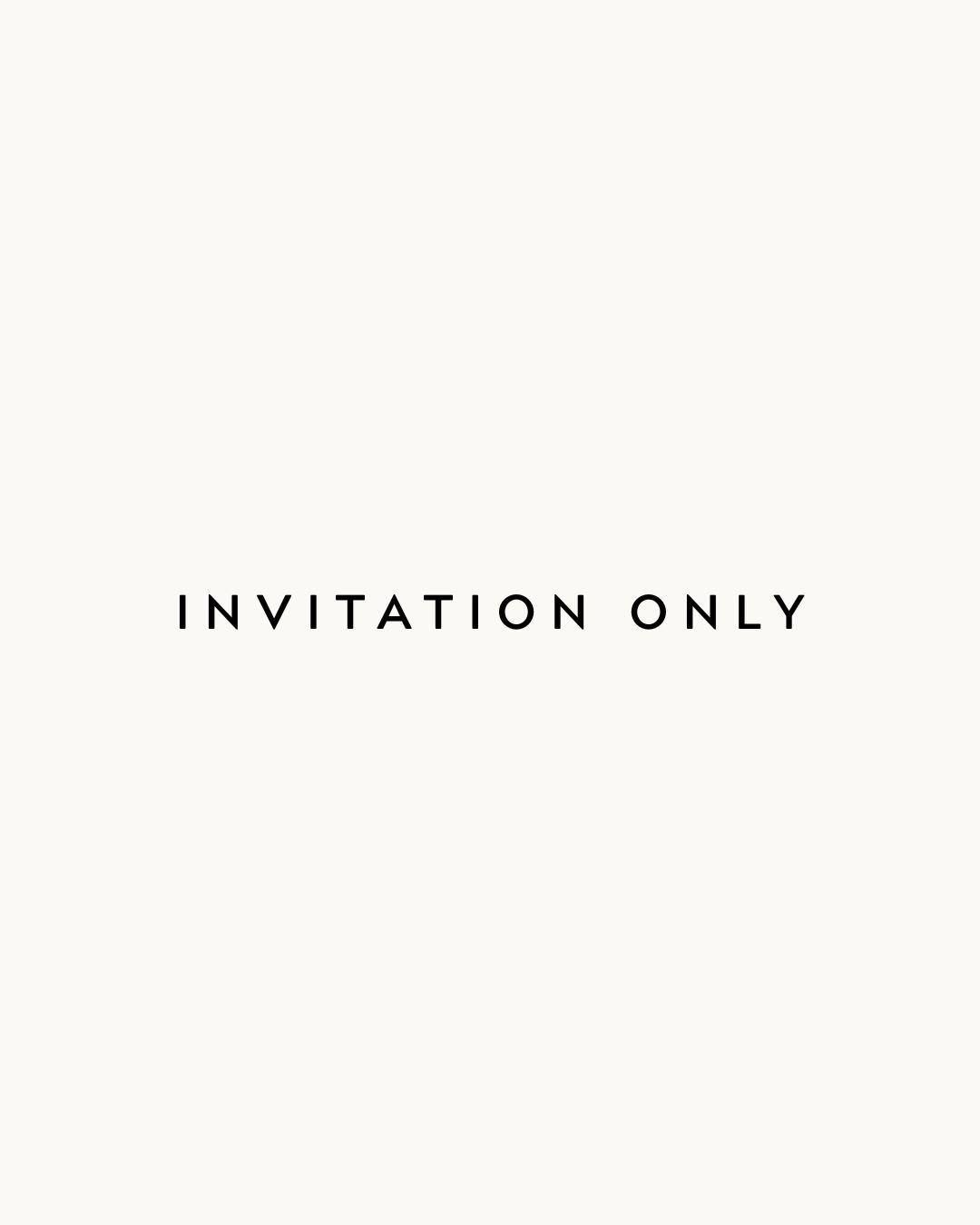 Text reading "Invitation Only" on a plain background.