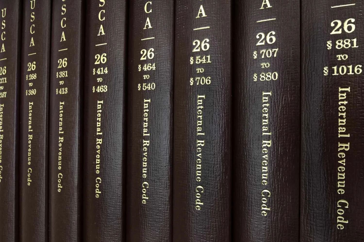 Close-up of Internal Revenue Code book volumes with brown covers and gold lettering on spines.