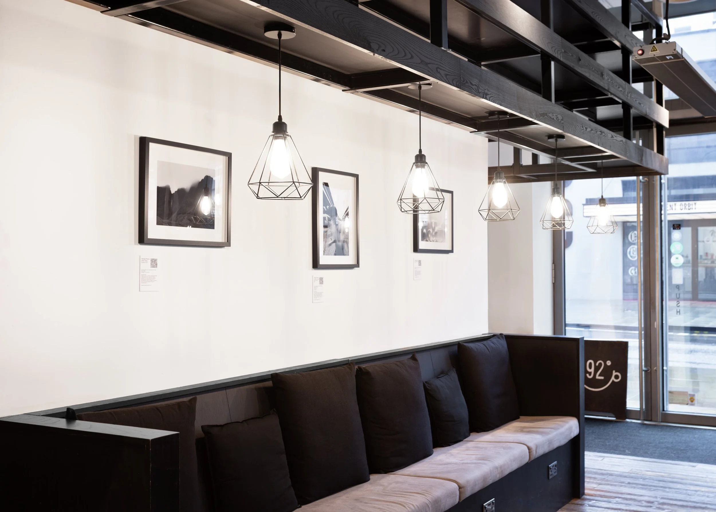Fine art photography exhibition by Yaroslav Prytula displayed inside 92 Degrees Coffee in Spinningfields Manchester