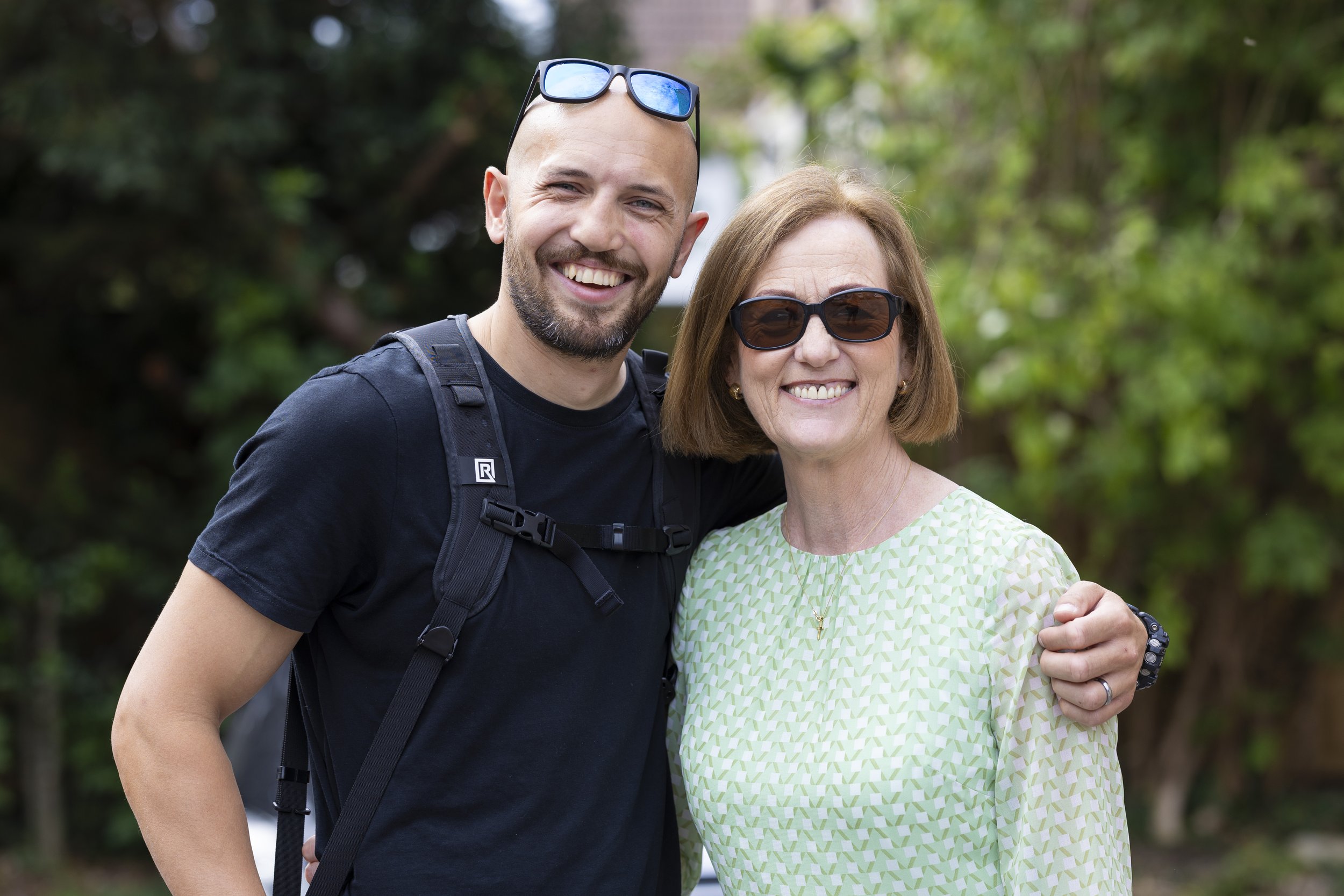 Posing for a photo with my mother in law while photographing a family wedding