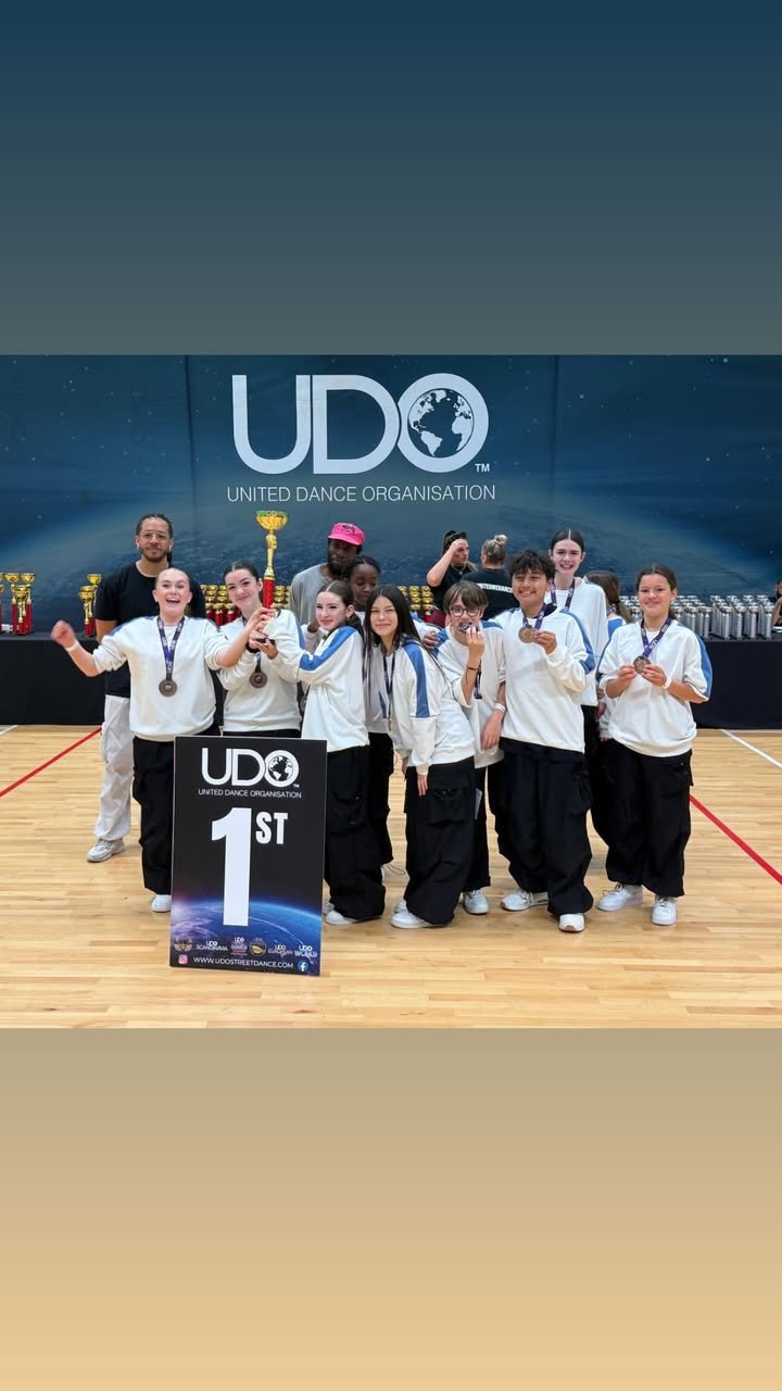 iDolise group trophy shotโ 1st place in Under 14 Novice at UDO Greater London 2025