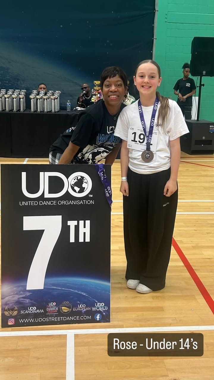 Rose Receiving Trophy โ 7th place in Under 14 solo category at UDO Greater London 2025
