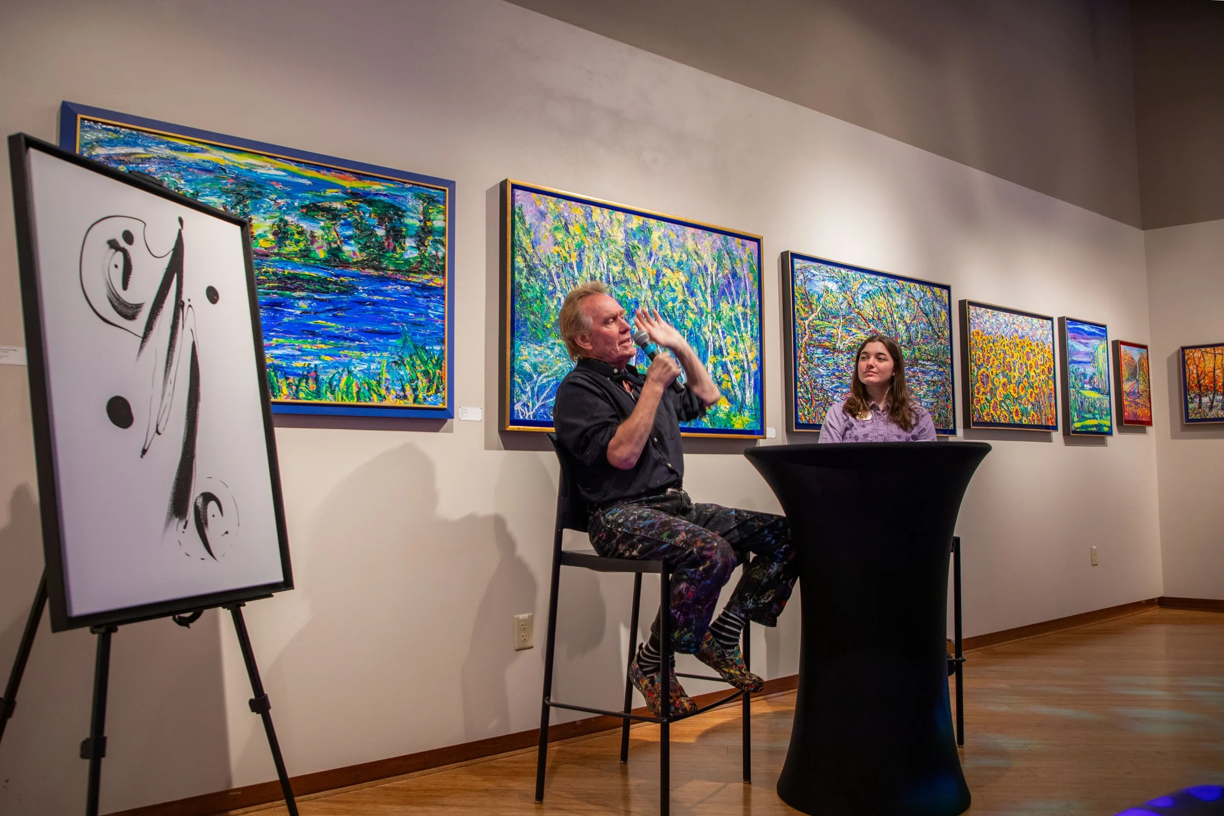 Guest Artist Derek Hambly on Nov. 19th, 2024 speaking during the reception in Roberta's Art Gallery located in UWW's University Center.