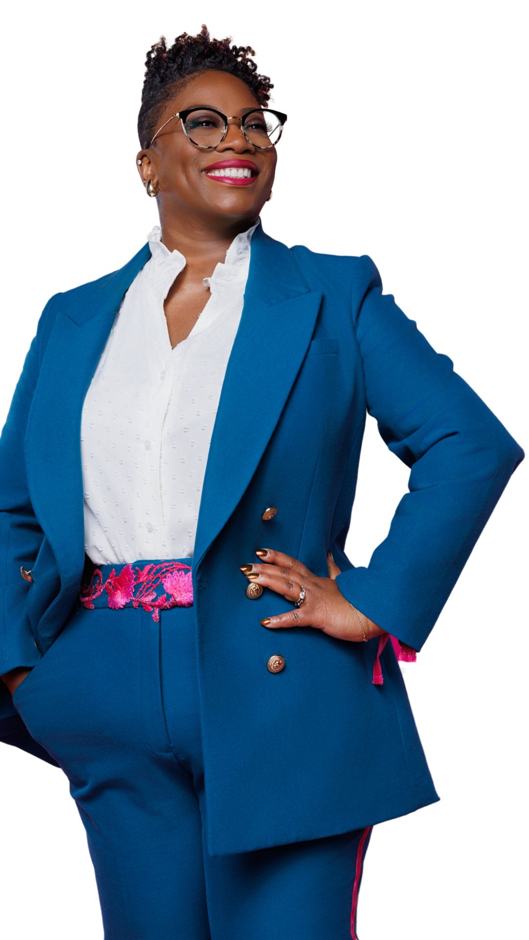 Princess Castleberry standing boldly, smiling, and wearing glasses.