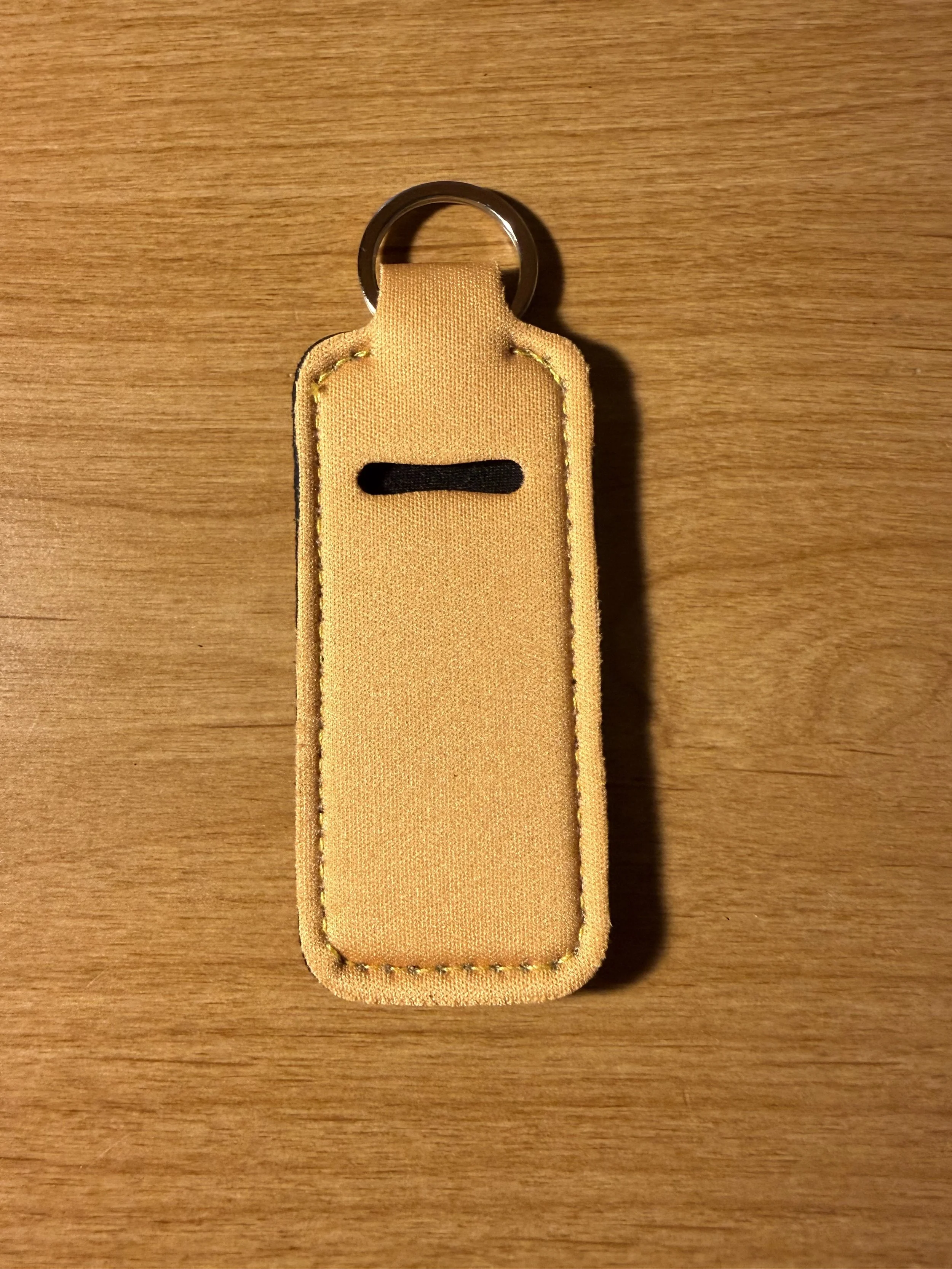 Gold Chapstick holder.jpeg