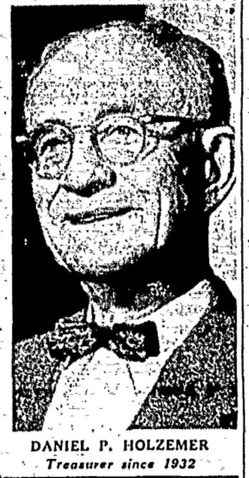 Black and white sketch of Daniel P. Holzemer, a man with glasses, wearing a bow tie and a patterned jacket, with the caption "Daniel P. Holzemer, Treasurer since 1932."